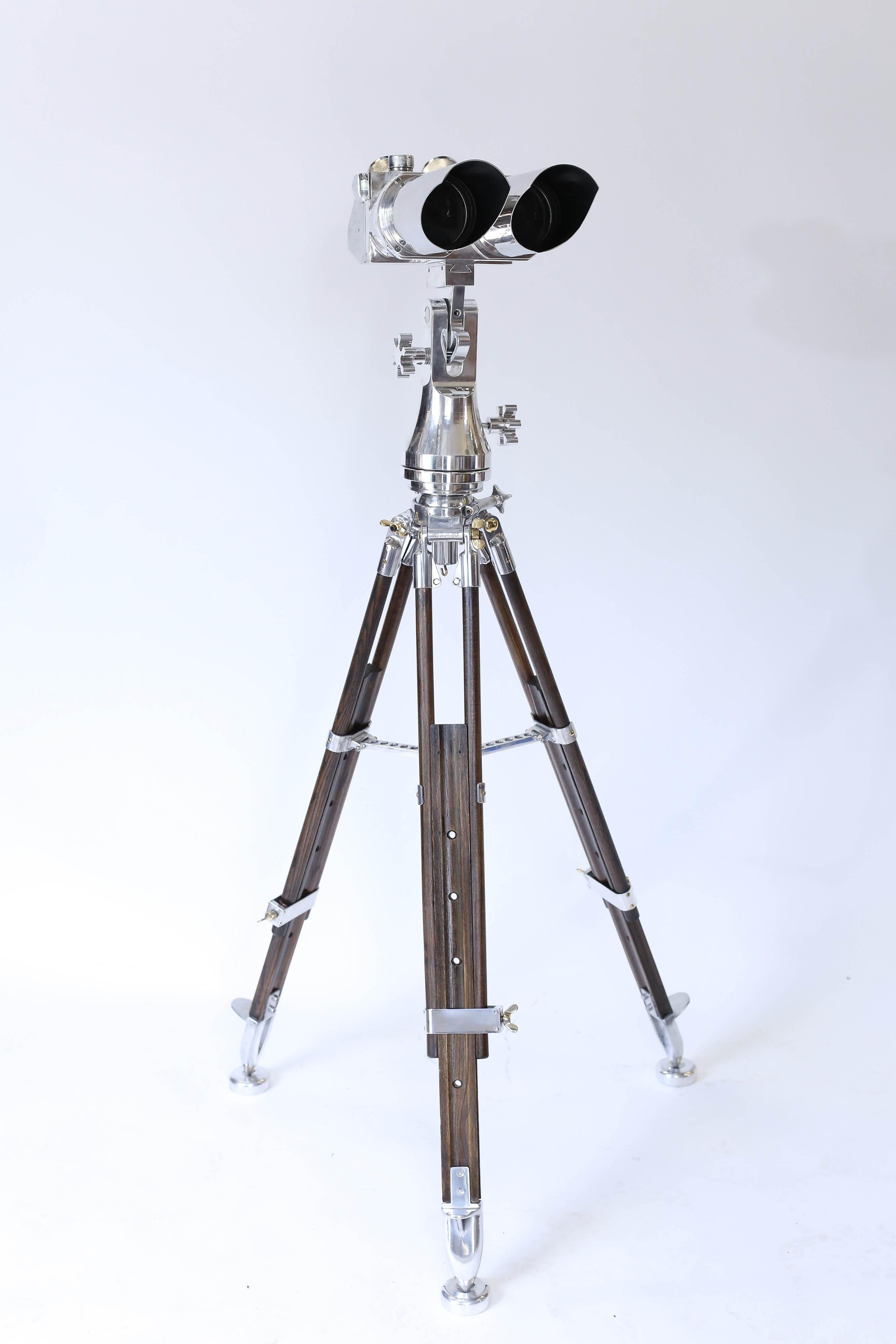 Fabulous Emil Busch German binoculars on a telescopic stand. Marked DF (Doppelfernrohr - Double Telescope) 10 x 80, CXN (3 letter wartime German coding for Emil Busch) 75494 ( serial number). These binoculars were originally produced for the German