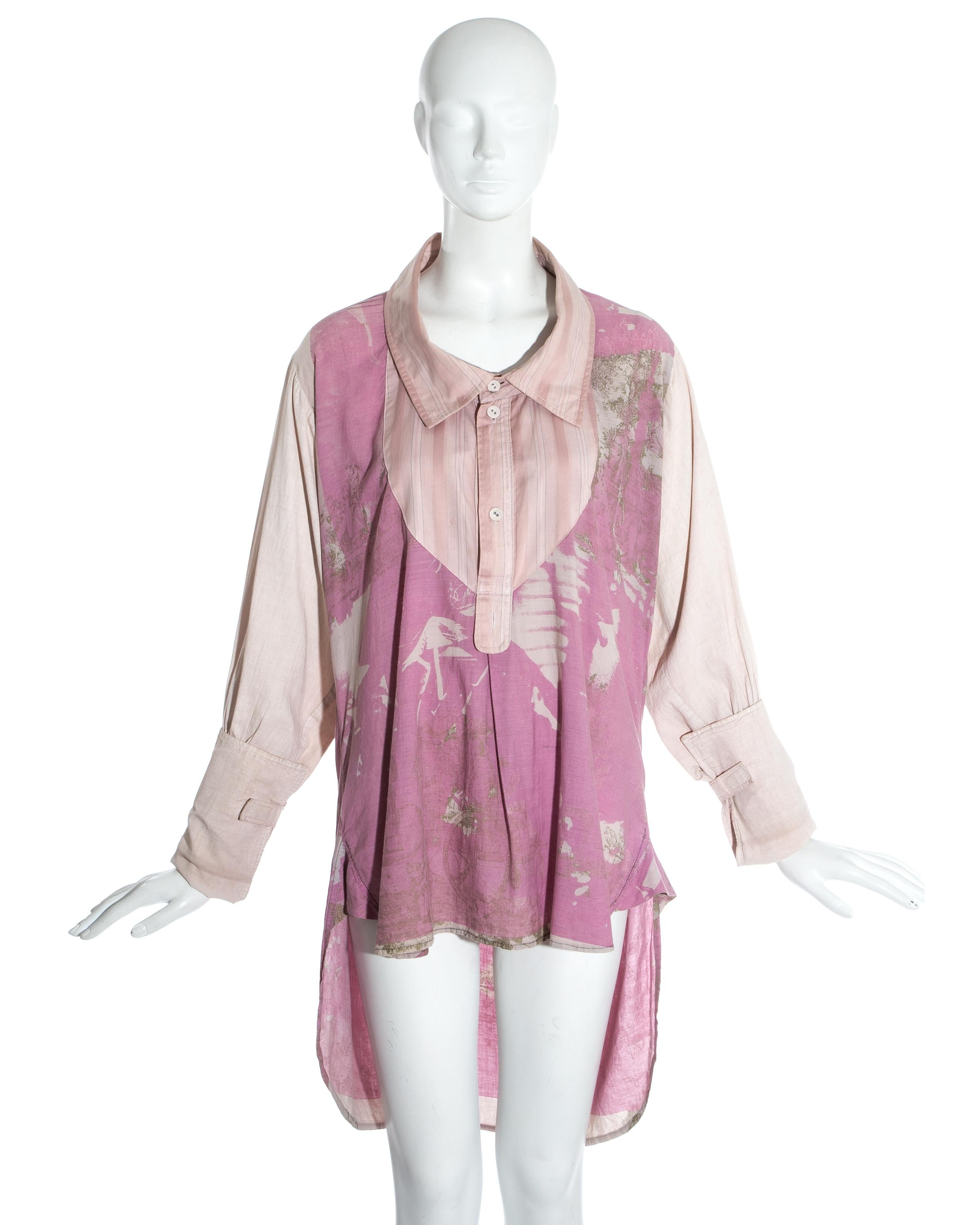 Worlds End by Vivienne Westwood and Malcolm McLaren. Pink cotton oversized blouse. Oversized turn up cuffs with Velcro fastening,  signature using Blade Runner (1982, dir. Ridley Scott) film still print and large striped cotton yoke. 

'Punkature'