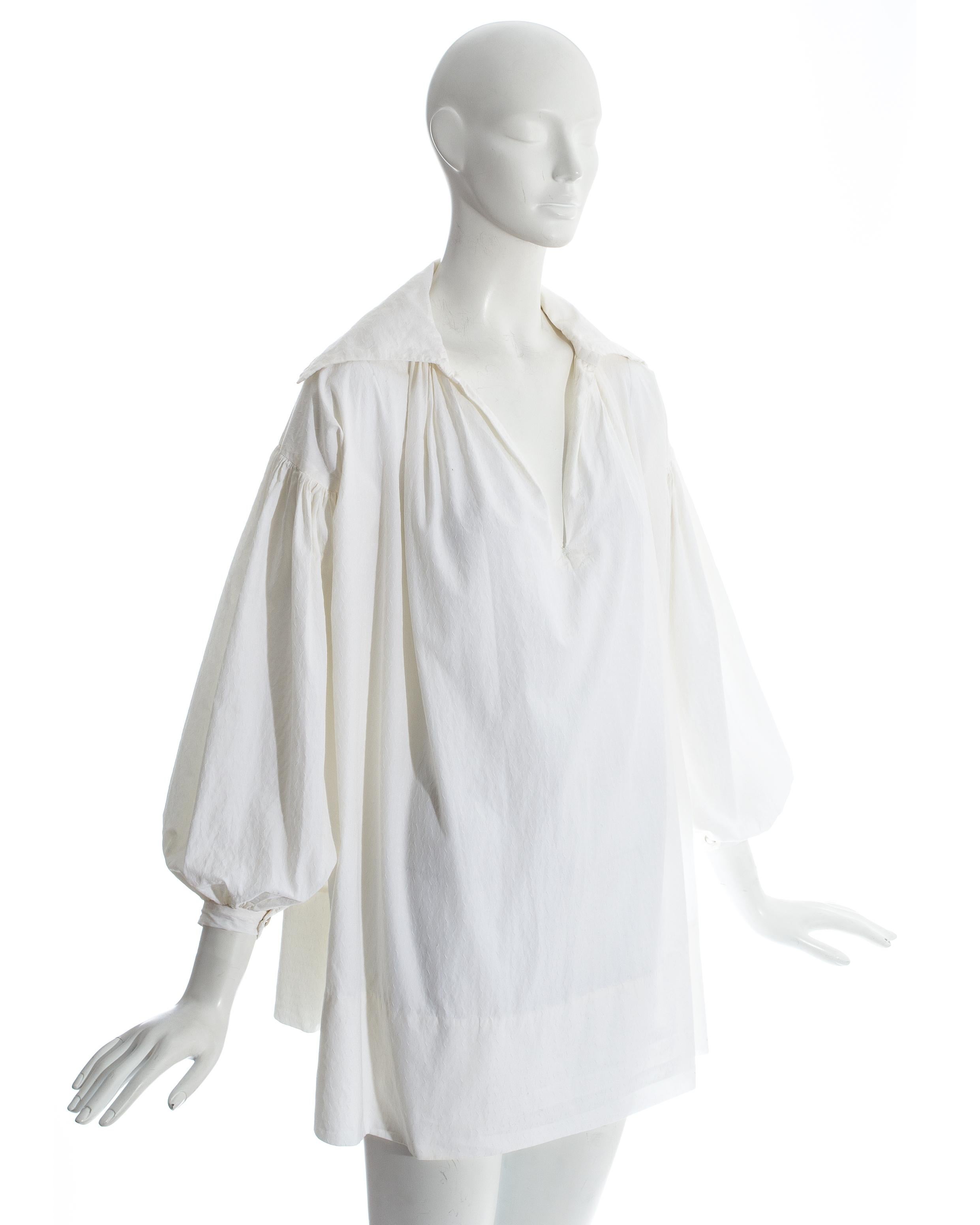 Worlds End by Vivienne Westwood and Malcolm McLaren; White oversized pirate blouse in cotton jacquard. Press stud fastening on cuffs. 

'Pirates' Fall-Winter 1981 