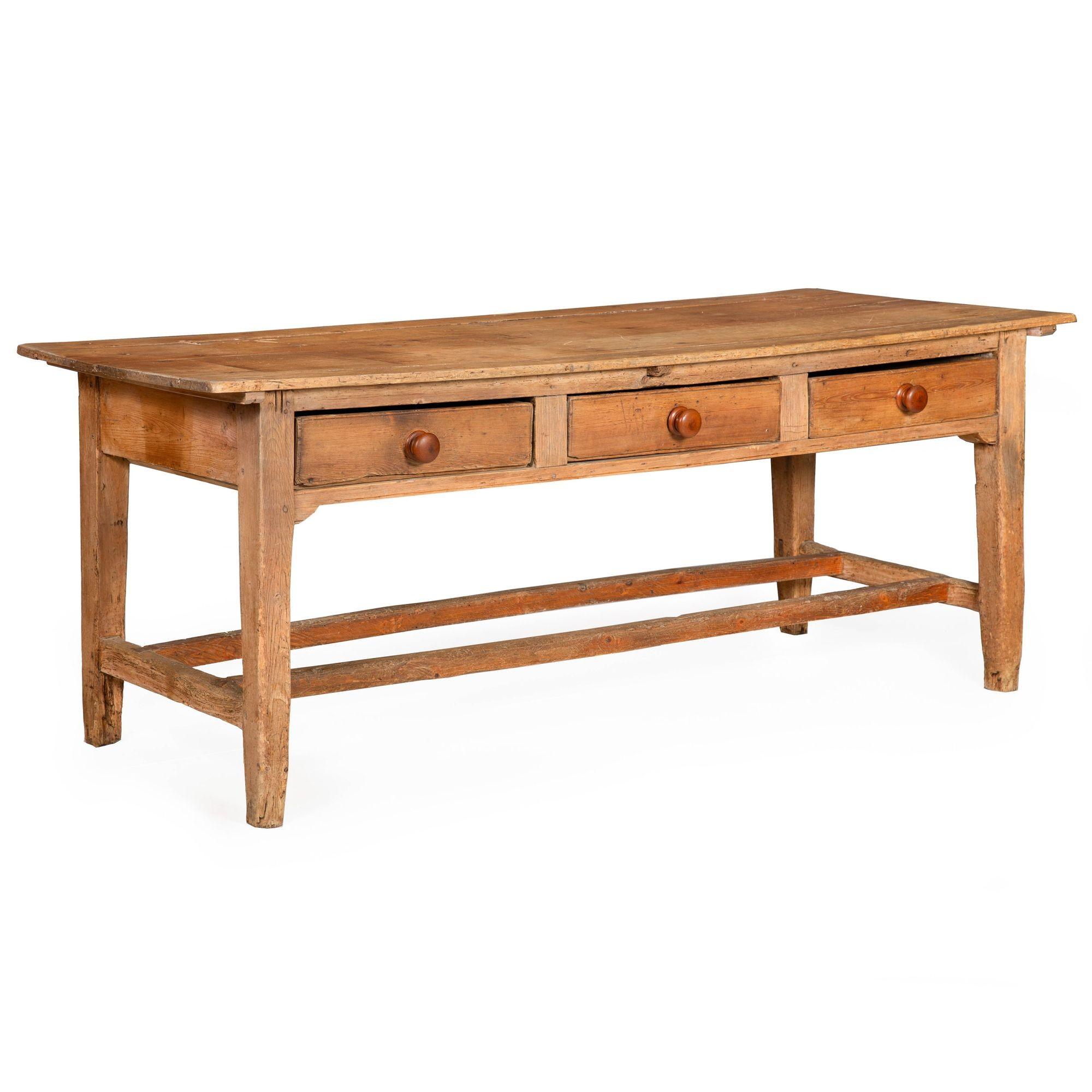 ENGLISH WORN AND PATINATED PINE TAVERN TABLE
Circa the mid-19th century, with three drawers in the apron
Item # 402VDP08Z

A richly worn tavern table with a wonderful all-over surface patina from well over a century of life and active use, this