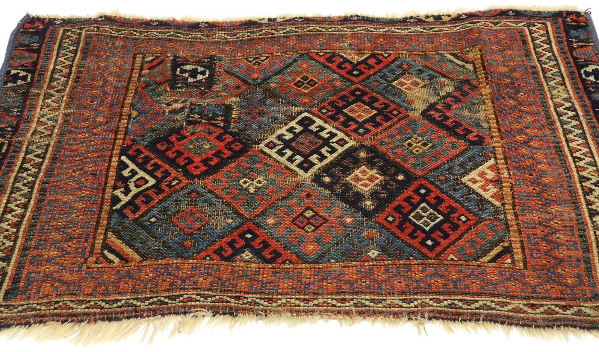 Hand-Knotted Worn Antique Caucasian Kazak Rug with Tribal Style For Sale
