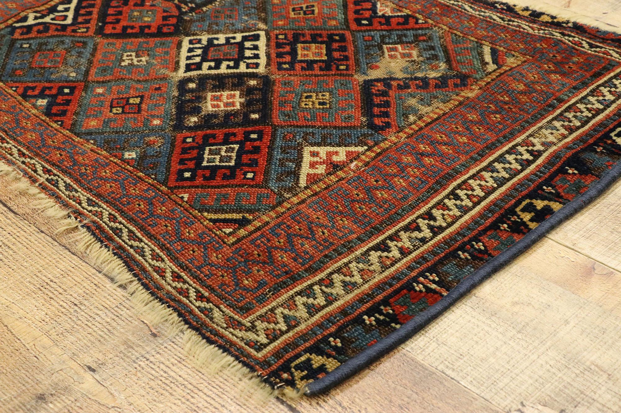 Wool Worn Antique Caucasian Kazak Rug with Tribal Style For Sale