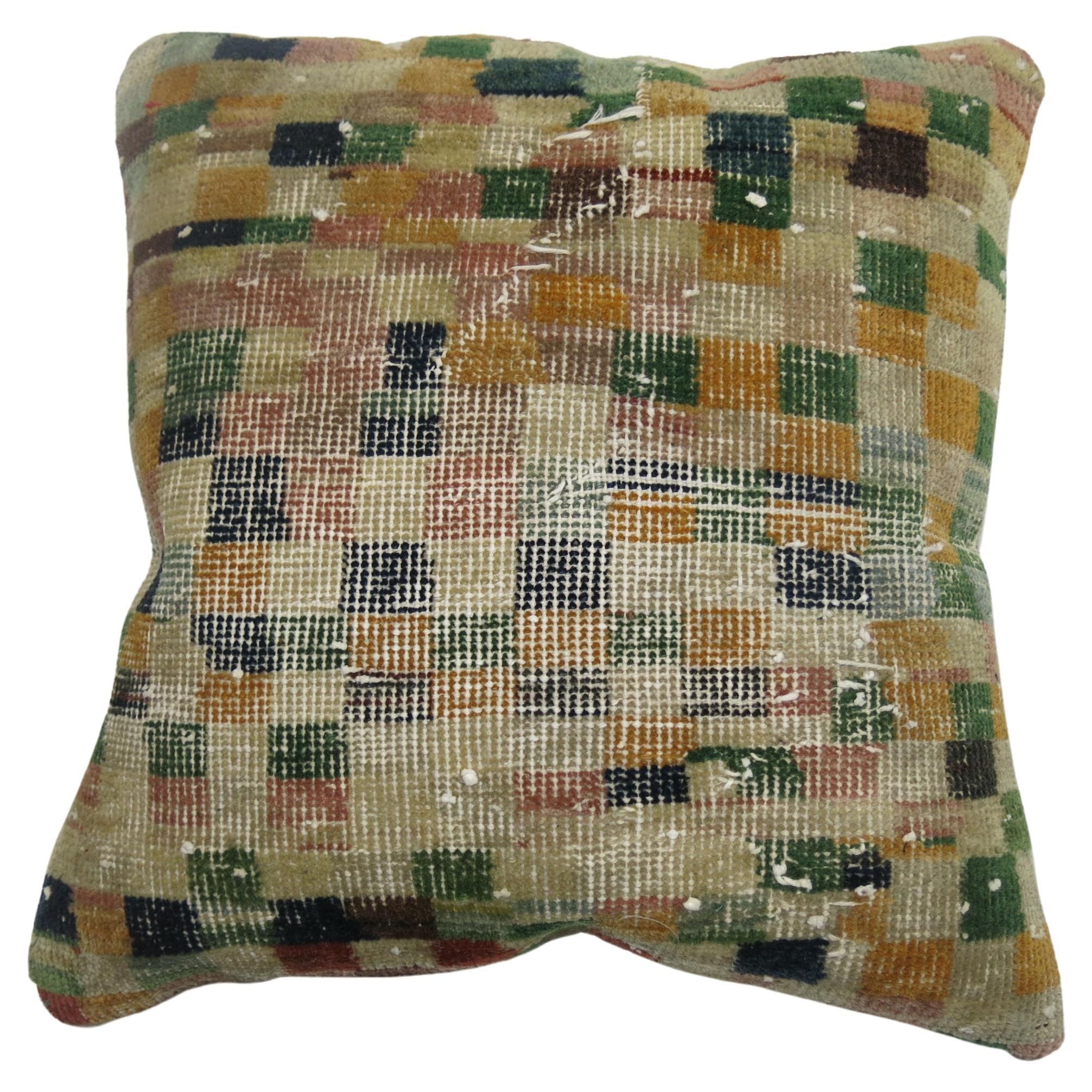 Pillow made from a Turkish Deco rug with a checkerboard motif

Measures: 19'' x 20''.