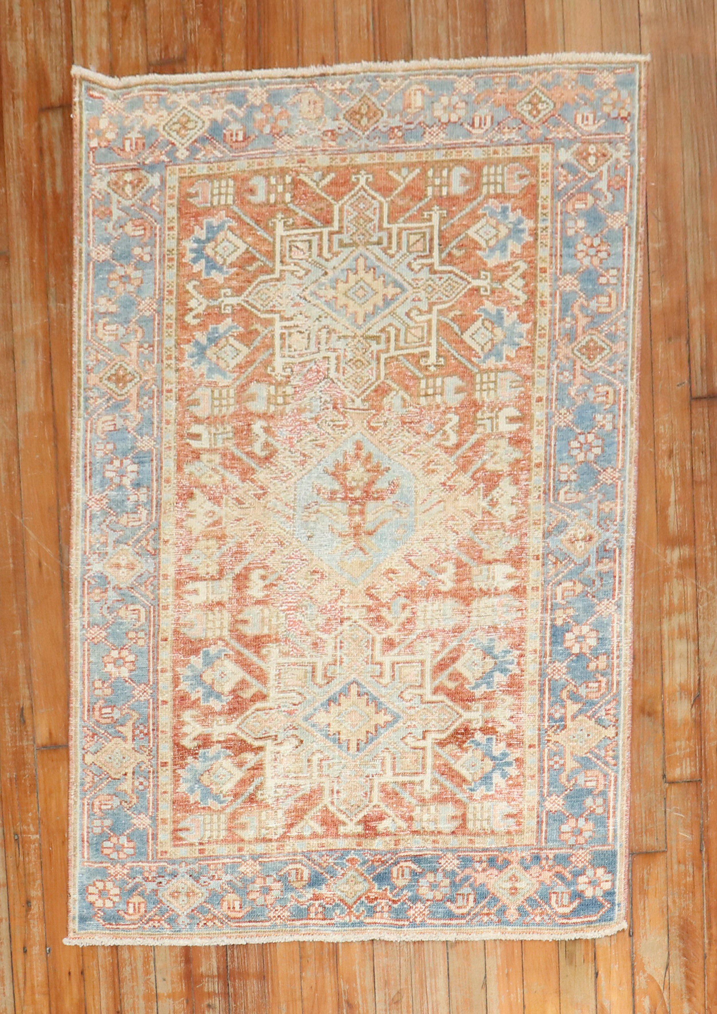 Antique worn heriz rug in Terracotta & blue

Measure: 2'11'' x 4'1''.