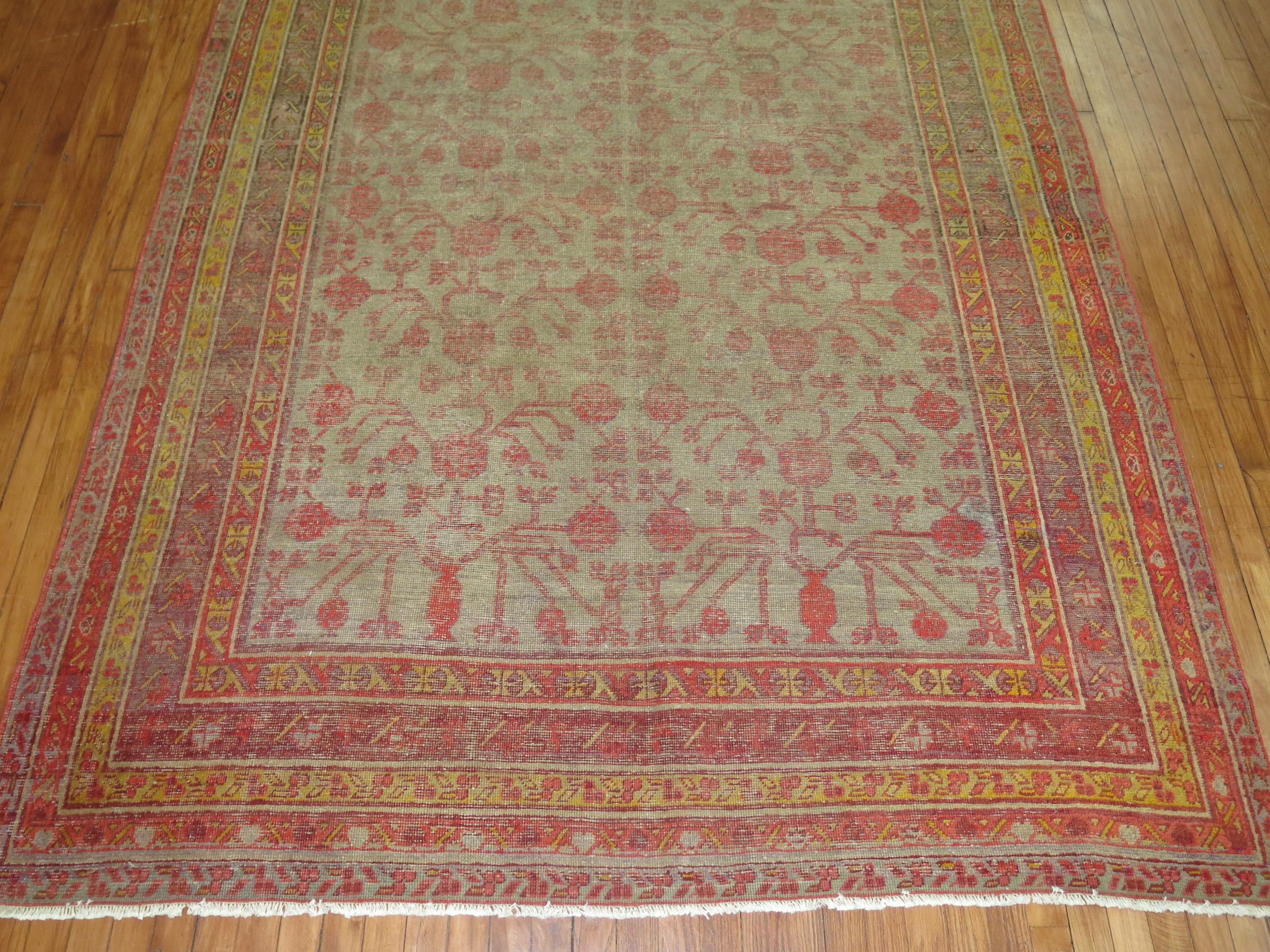 Hand-Woven Worn Khotan Antique Gallery Rug For Sale