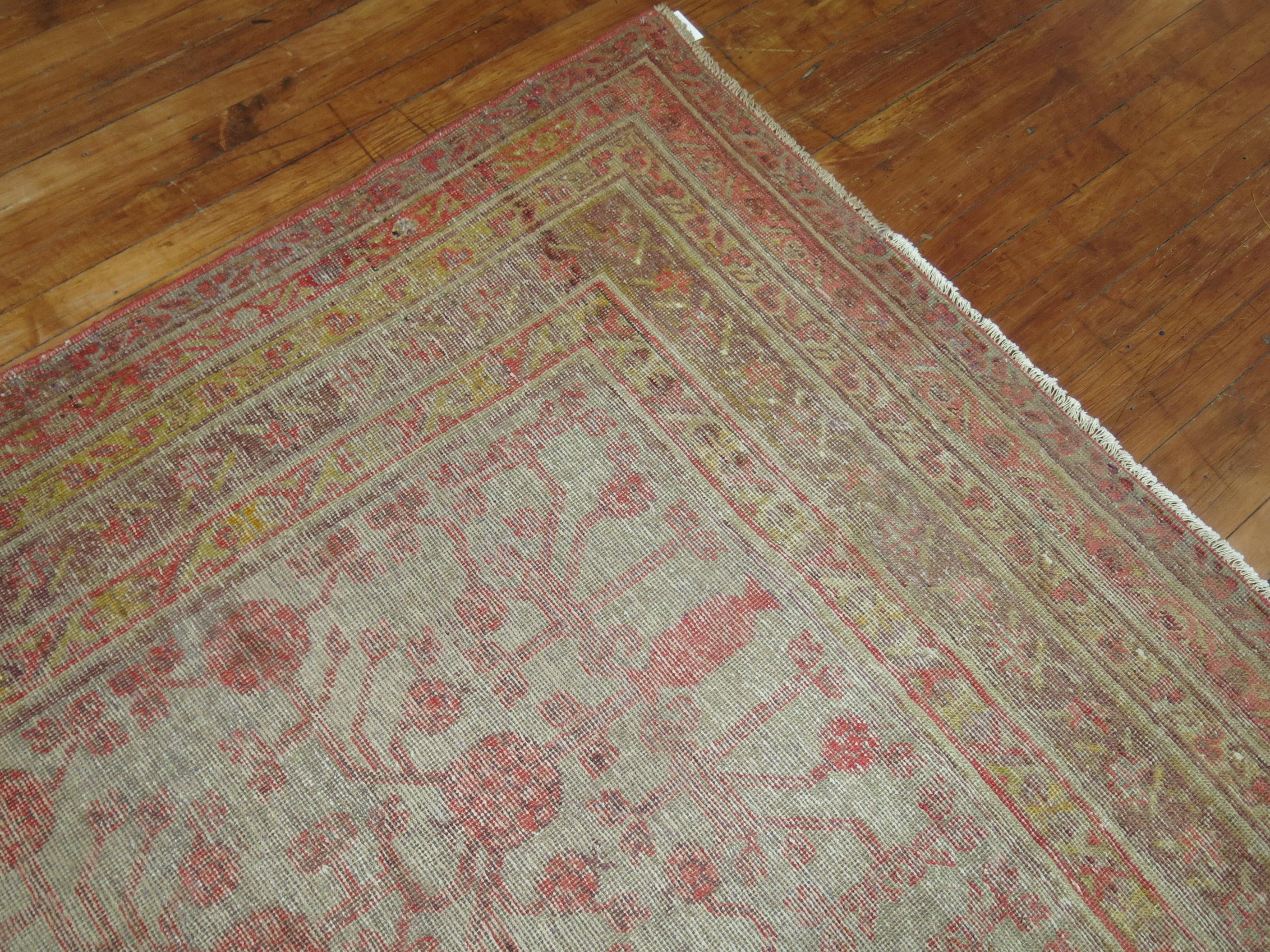 20th Century Worn Khotan Antique Gallery Rug For Sale