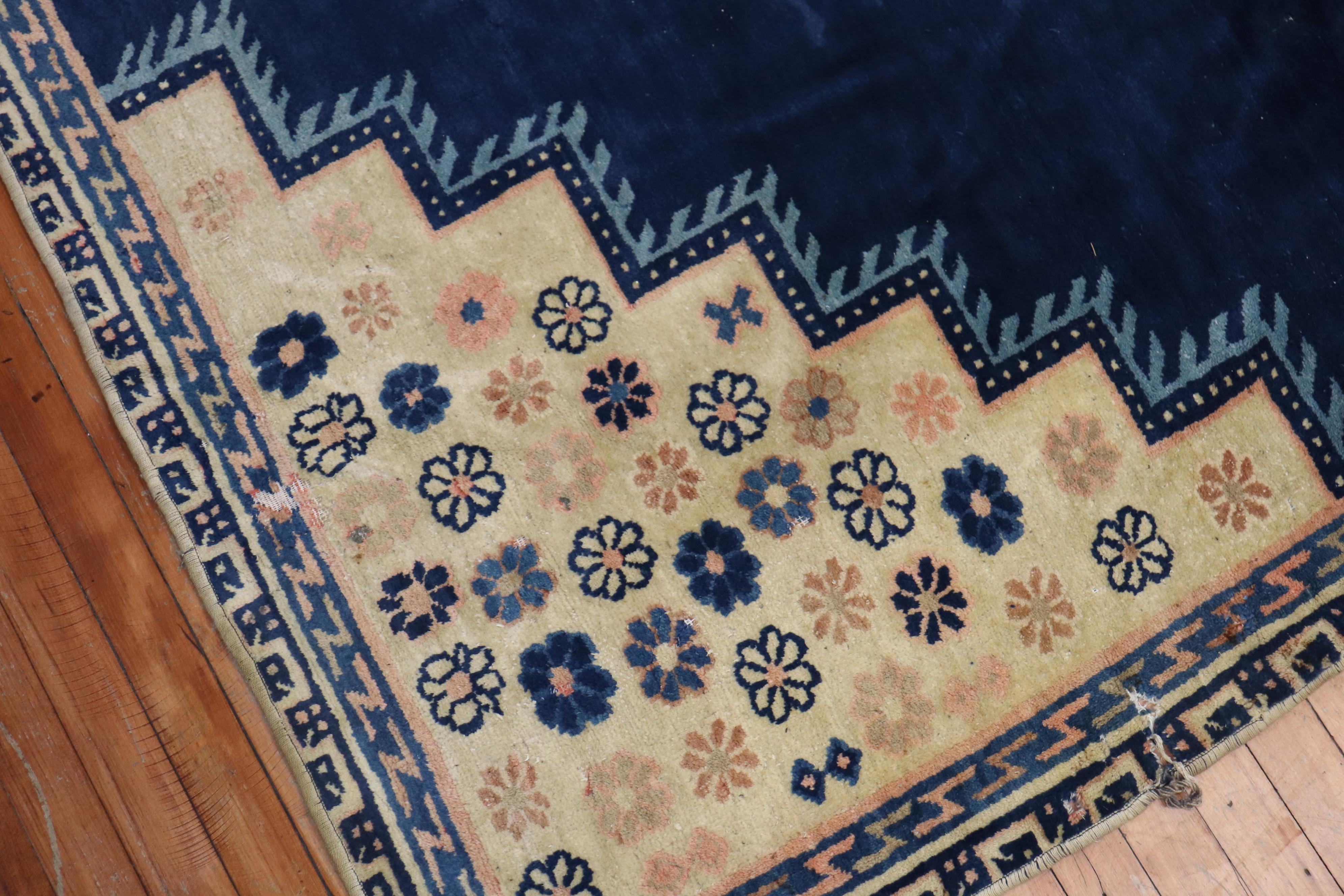 an early 20th century worn Chinese antique oversize one of a kind rug

Measures: 10'9' x 15'4''.