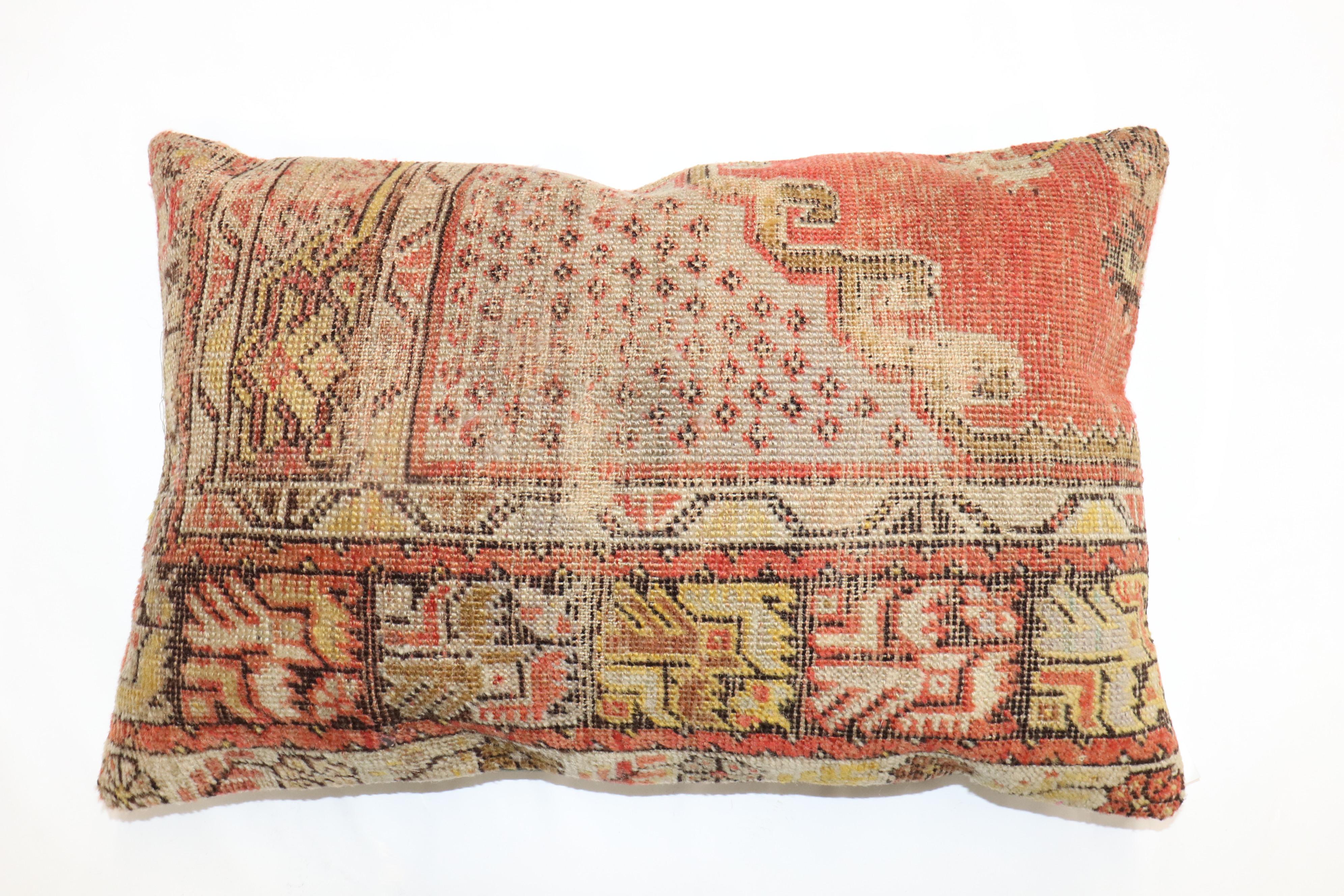 Pillow made from a turkish rug. Polyfill provided

Measures: 15'' x 23''.