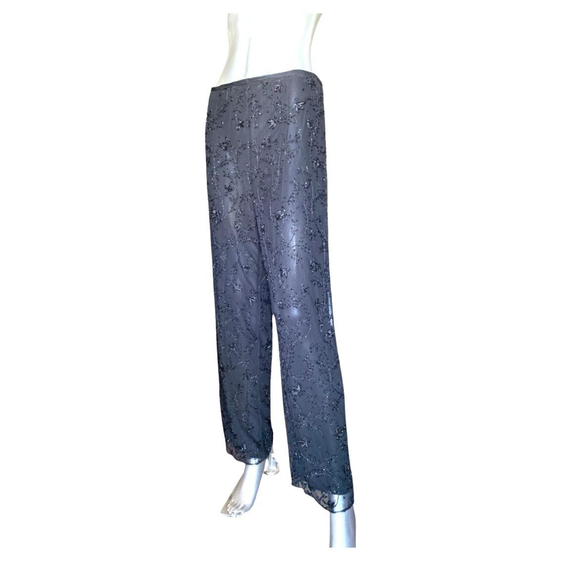 Such a beautiful pair of pants designed in limited edition by Worth New York. So happy to list these in size 16 as we find very few chic, high quality evening clothes in sizes 14 and up. These chiffon pants are lined. Intricate and lovely sequins