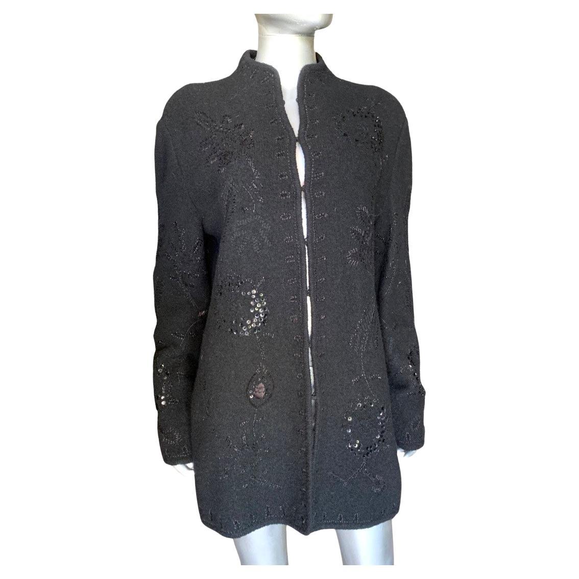 So happy to find another beautiful limited Edition piece by Worth New York. The size tag has been removed, but it is a Size Large. would fit sizes 12-16. beautifully made and embellished with sequins over black embroidery. Covered hook and eyes