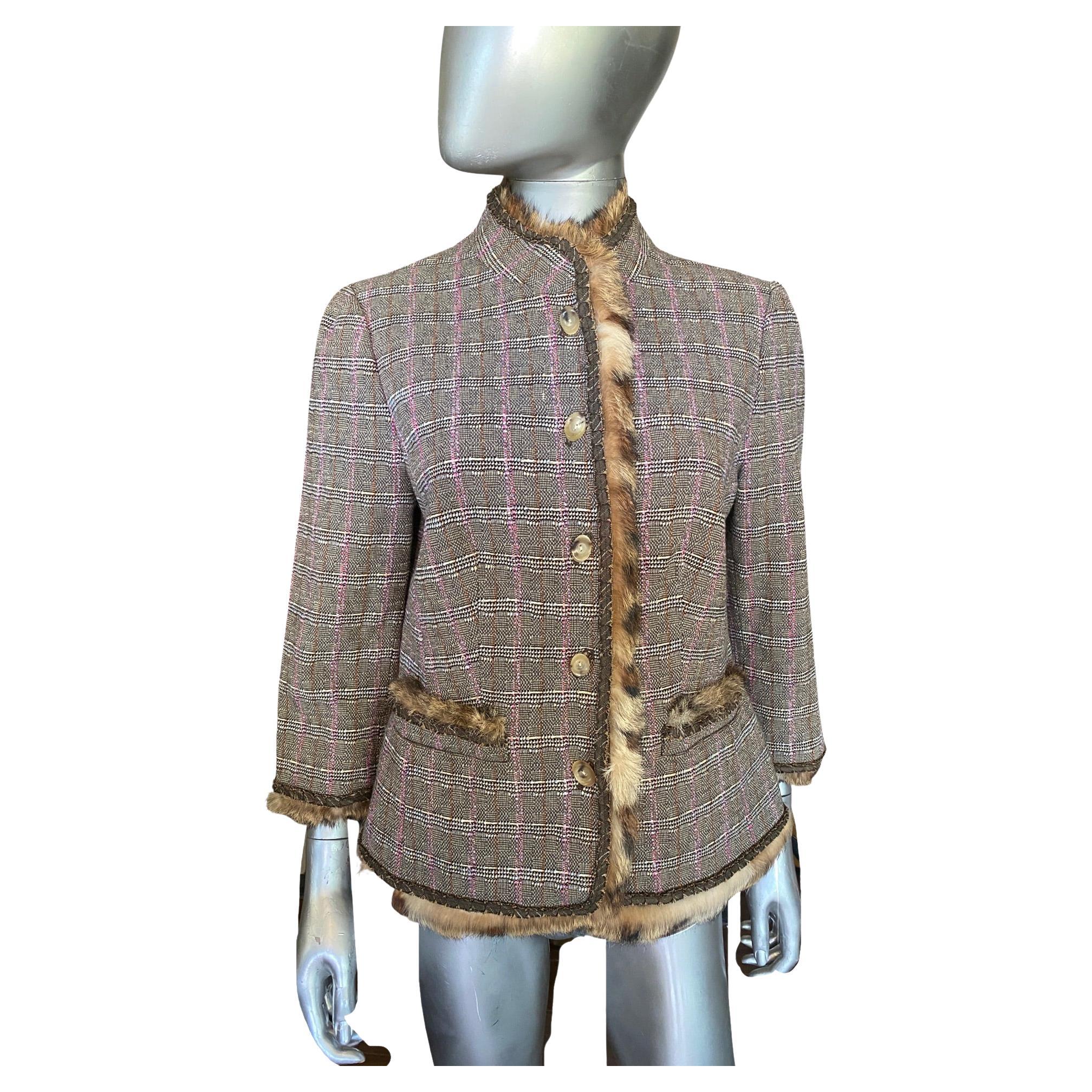 Another chic suit designed by Worth New York. This wool (blend) plaid is modern. Brown based, it is crossed with lilac and rust color to form the plaid. A perfectly chic early fall jacket (size 12) beautifully made by Worth New York City. The wool