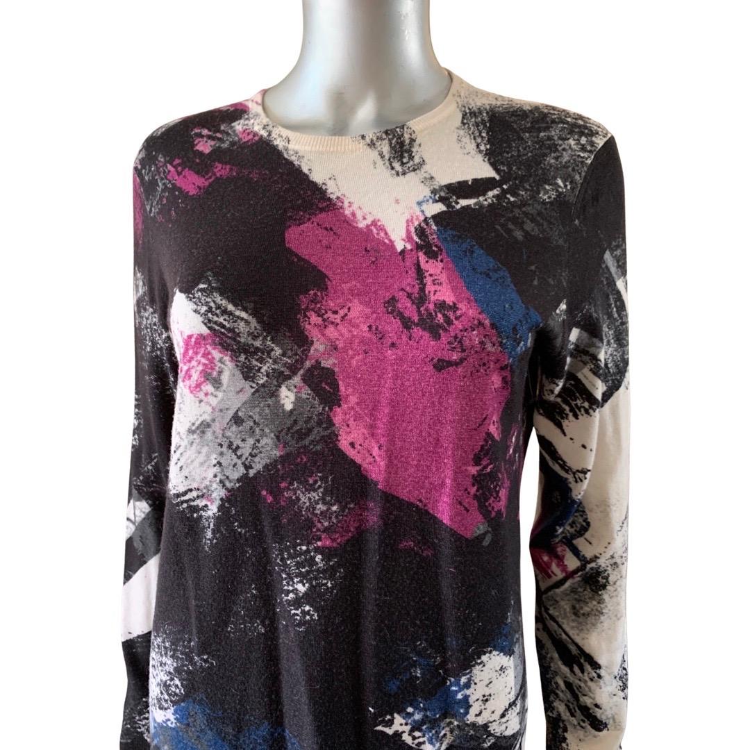 Another beautiful item from Worth New York. This pullover sweater was part of a collection that used Modern Art abstract prints. 100% lightweight wool. Matching coat in woven wool available on separate listing. Size L but does not run big so easily