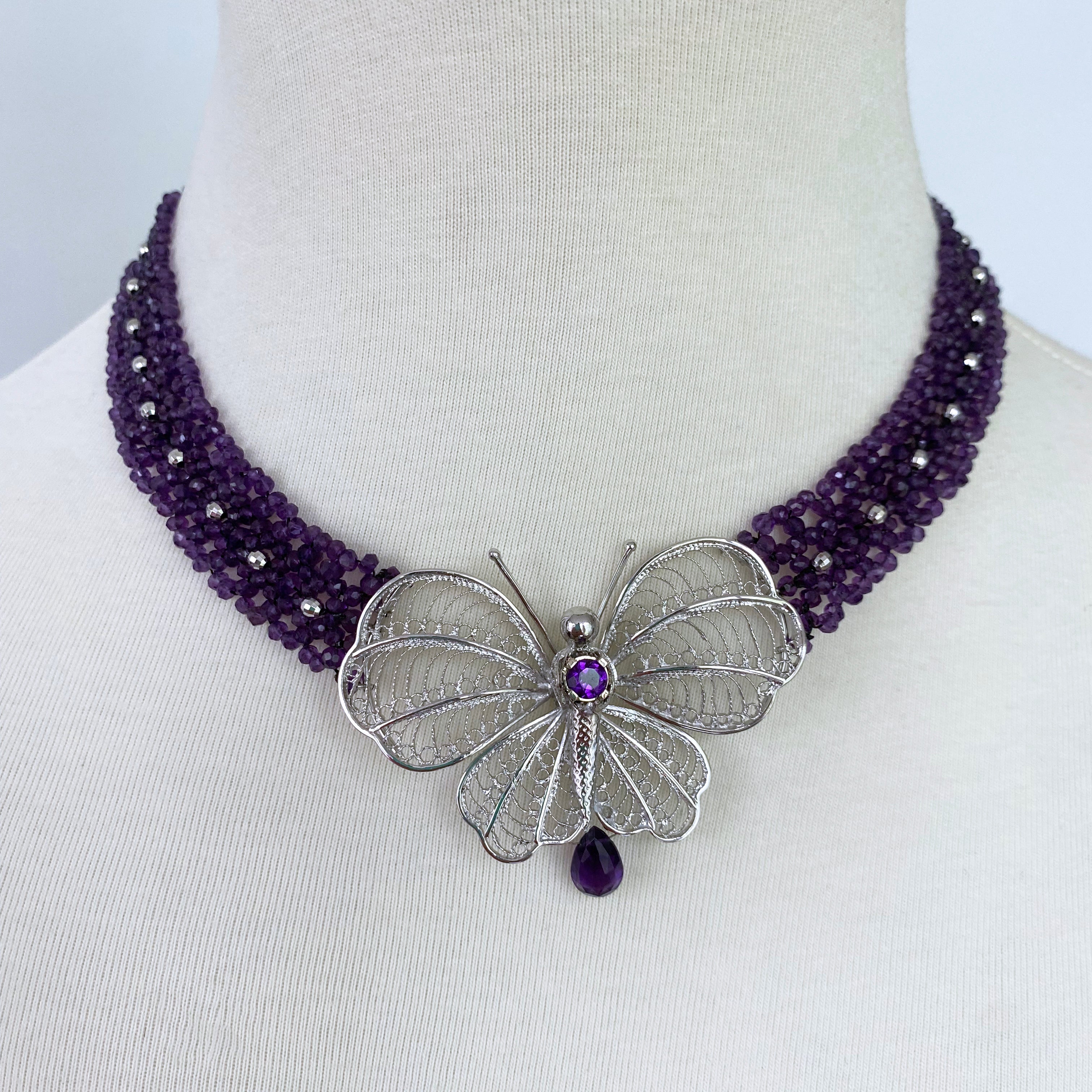 Collana di ametista intrecciata con centrotavola a farfalla in argento