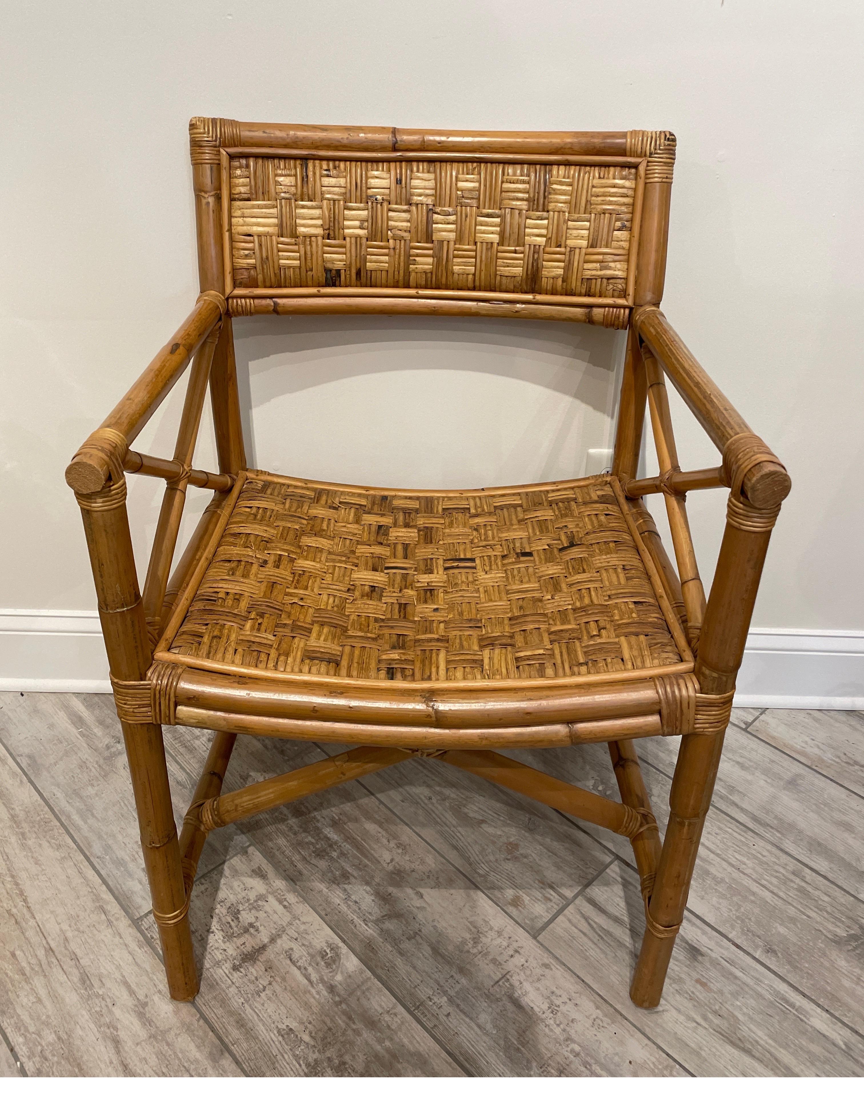 Vintage woven bamboo campaign armchair. Both seat & back are a woven basket weave pattern. Very sturdy frame & construction.