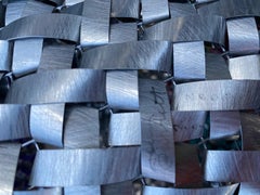 Scultura di cesto intrecciato dello scultore John Garretts