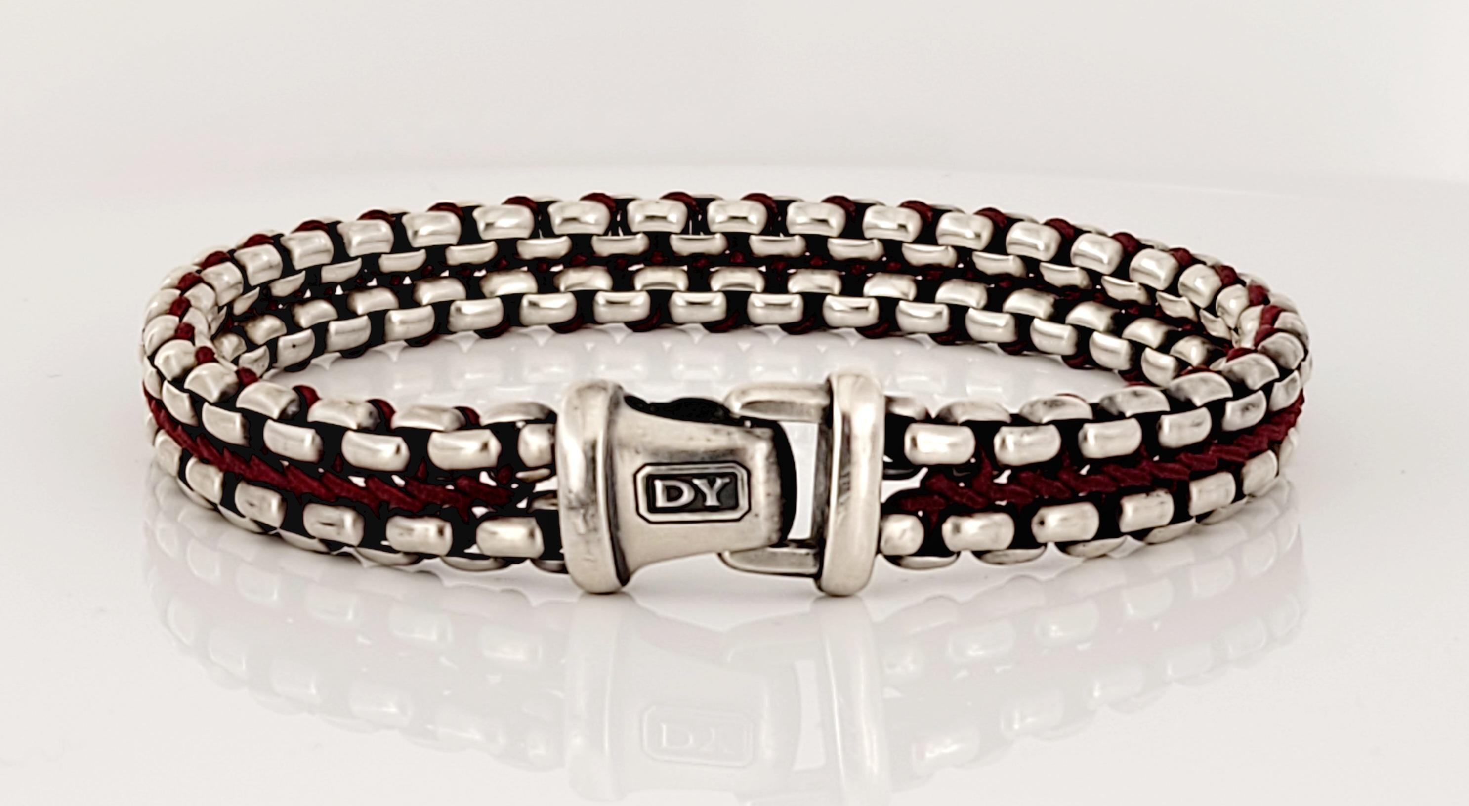 David Yurman Woven Box chain Bracelet
Red Nylon 
Material Sterling Silver
Metal Purity 925
Bracelet 10mm
Bracelet 8.5'' long
Bracelet Push clasp 
Gender Men 
Weight 43.1
Condition New, never worn 
Retail Price $695
Comes with David Yurman pouch