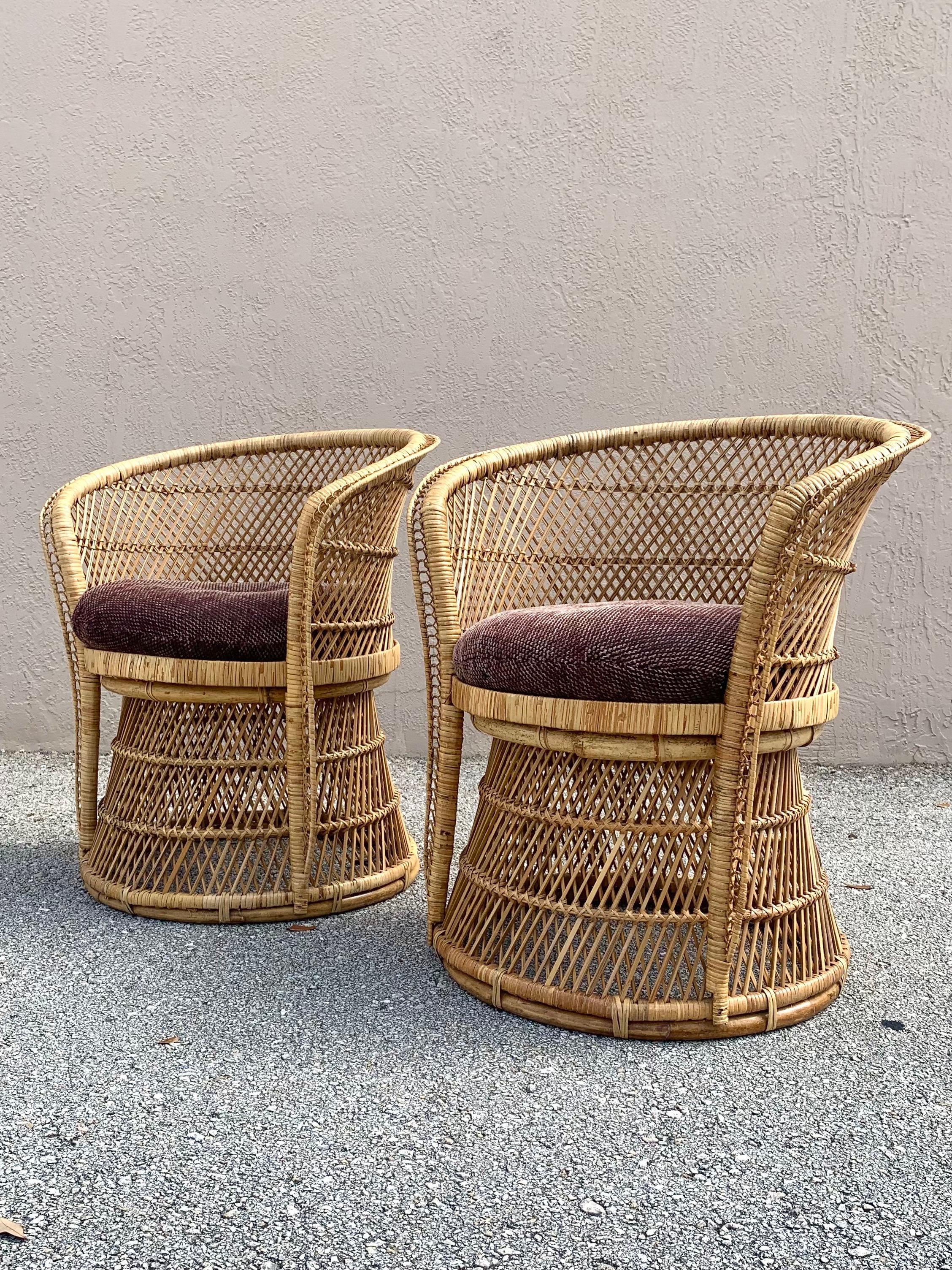 Woven cane arm chairs. After the Spanish Emmanuelle style. Beautifully made with tons of personality. 

Structurally strong with original cushions. 

Would fit well in boho, Mid-Century Modern, and naturally designed rooms,.
