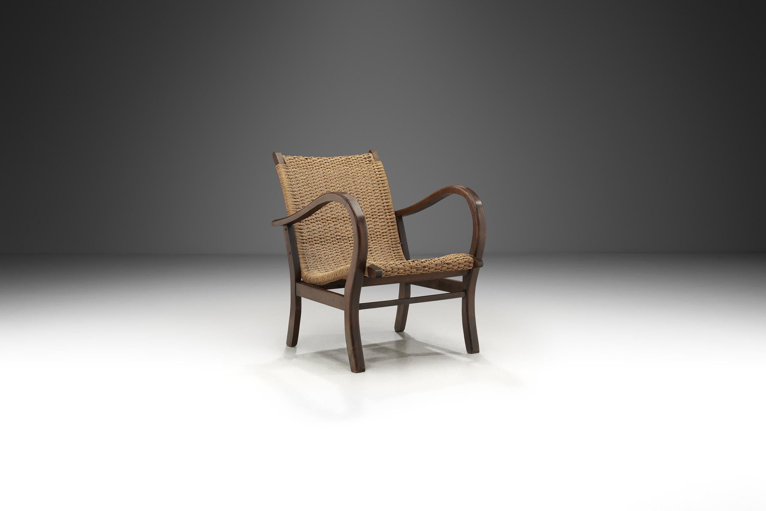 Erich Dieckmann was one of the pre-eminent furniture designers of the Bauhaus and, like Marcel Breuer, was experimenting with steel tubing, standardization, and geometric forms in the 1920s and 1930s. The design of this chair is the result of one of