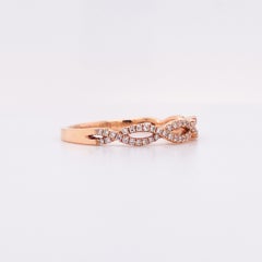 Bague en or rose 14k à diamants croisés avec 0,19cttw et torsion