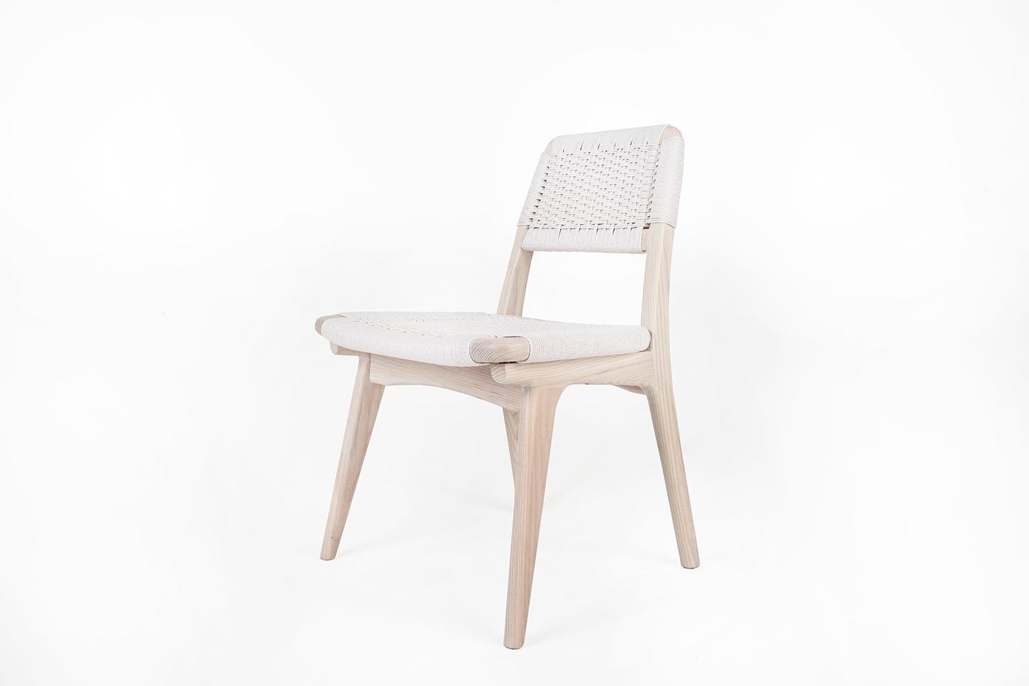 Midcentury inspired Rian low back dining or office chair made with hardwood and woven Danish cord. Can be made with any domestic or exotic hardwood of your choosing. All the beauty and sophistication of our Rian collection realized in a new low back