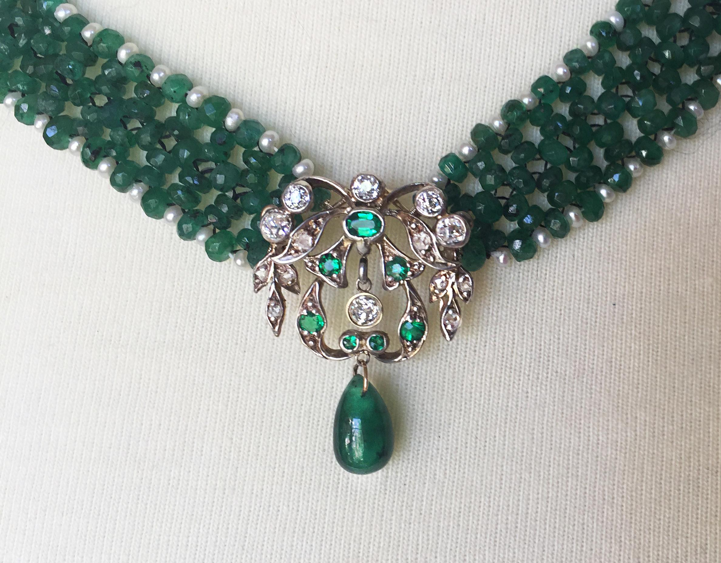 This woven emerald and pearl necklace with vintage diamond and emerald centerpiece is vibrant and striking. Marina J.'s hand made this necklace with attention to detail so that every bead harmonizes perfectly. The brilliant green faceted emerald