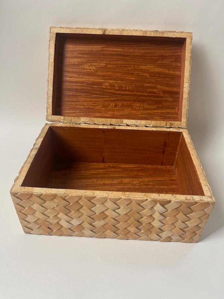 Woven Faux Cane Domed Box
Possibly made by Maitland Smith
The surface of the box creates an illusion of a traditional woven straw box
