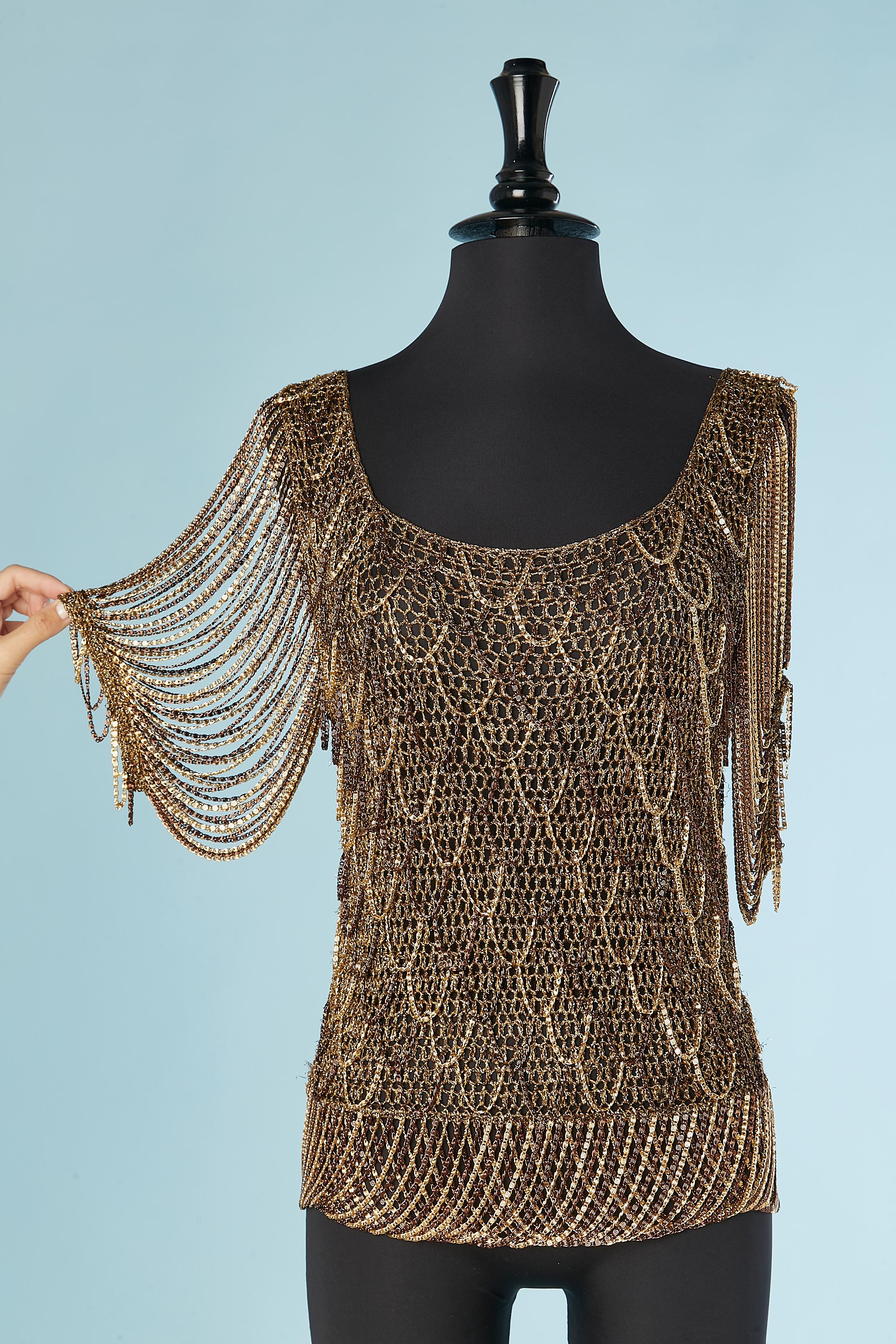 Woven gold and copper tone chain and knit sweater. The top slips overhead and is unlined. 
SIZE M 