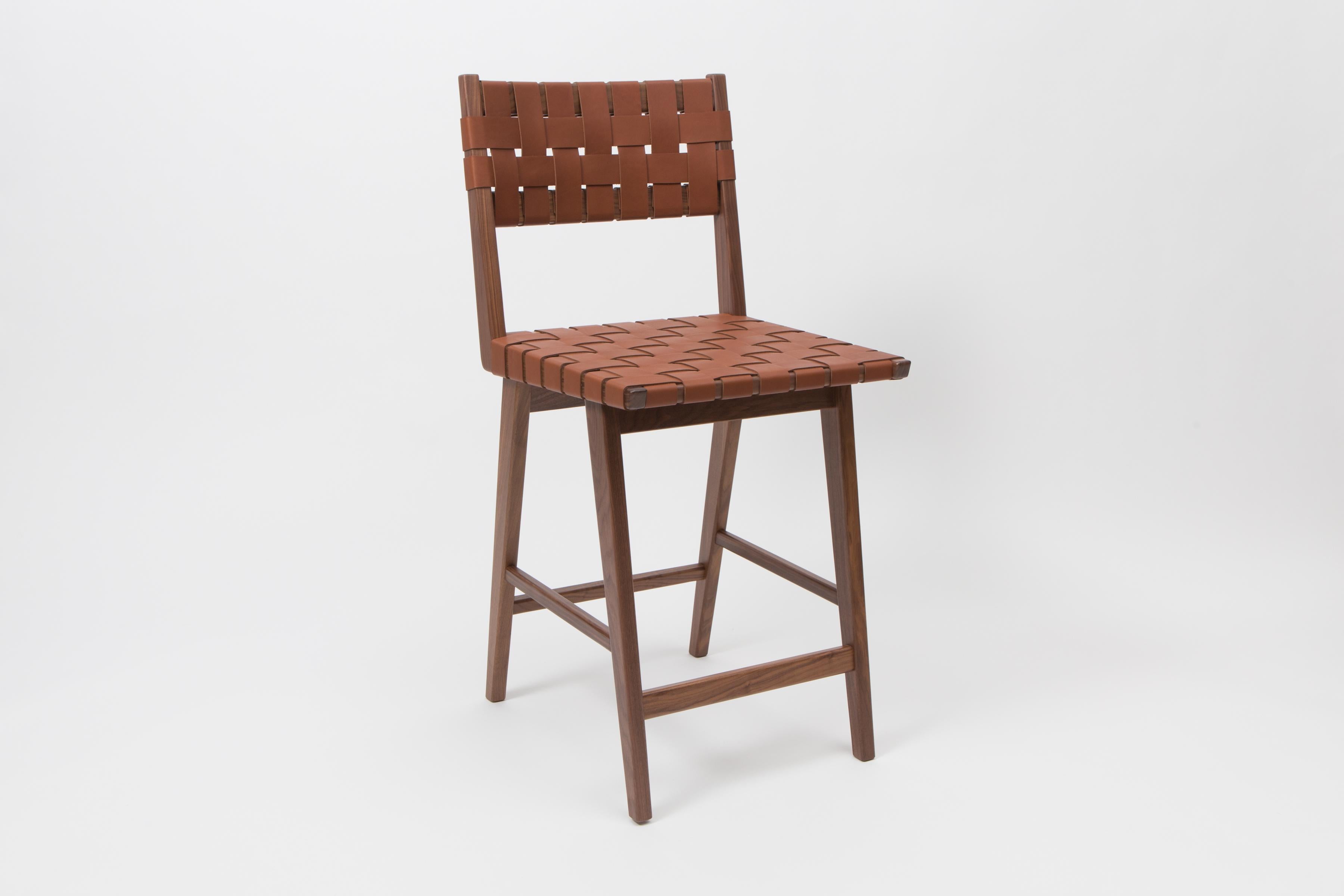 Originally designed by Mel Smilow in 1956 and officially reintroduced by his daughter Judy Smilow in 2016, the Woven Leather Backed Counter stool is classically midcentury. The simplistic beauty, fine craftsmanship, and exceptional detail is present