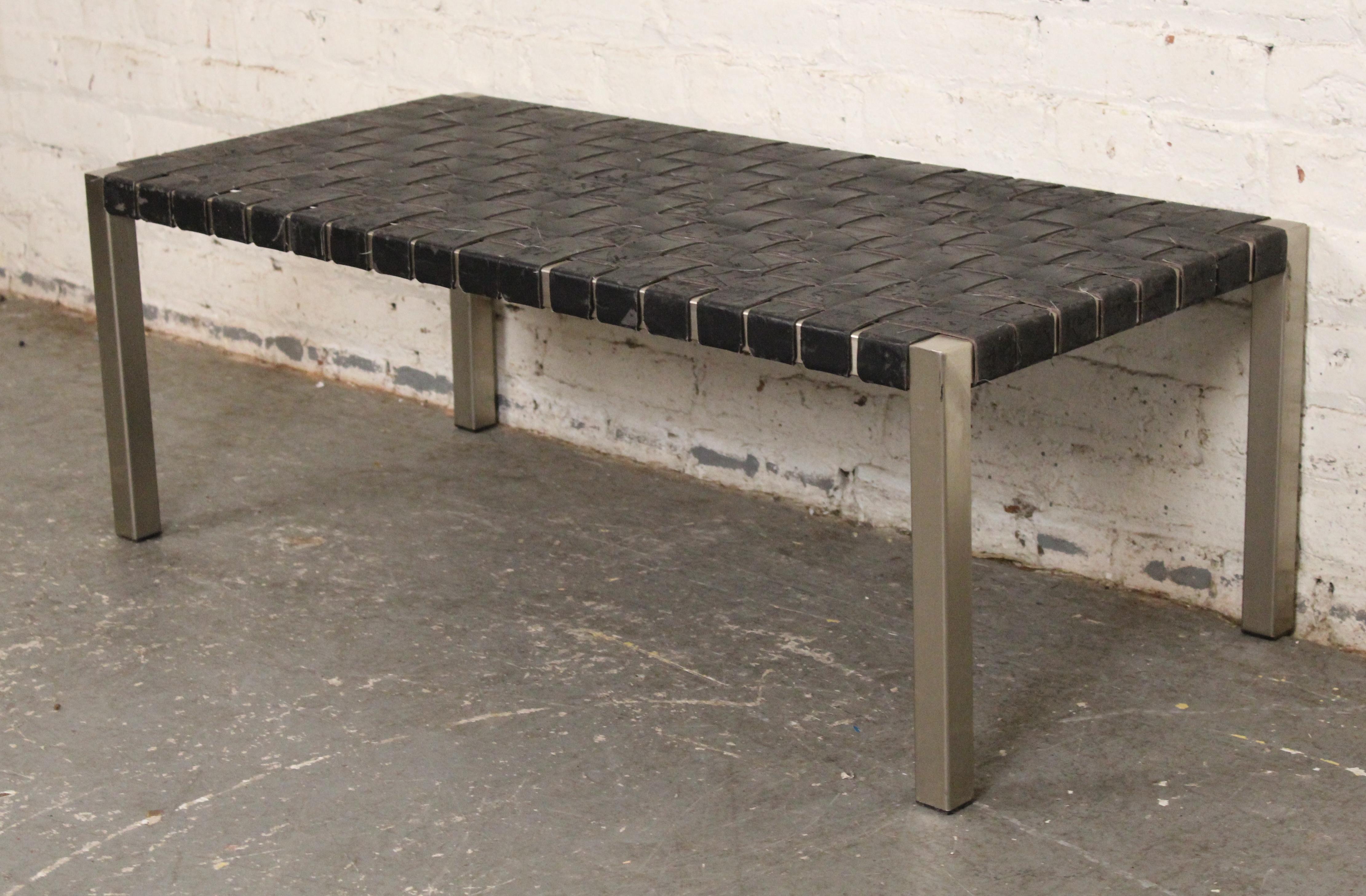 This bench is similar to the Erwine & Estelle Laverne woven bench, with black leather woven straps and stainless steel frame. The straps are worn, but not broken.
Please confirm location NY or NJ