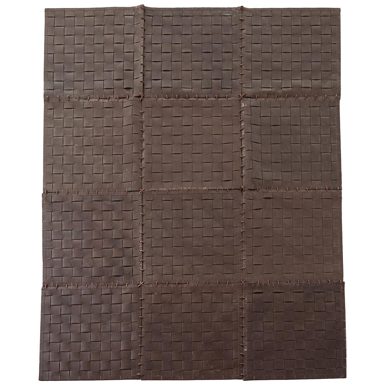Tapis ou moquette à lanières en cuir tissé