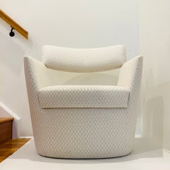 Fauteuil de salon tissé en tissu ivoire de La Maison Pierre Frey