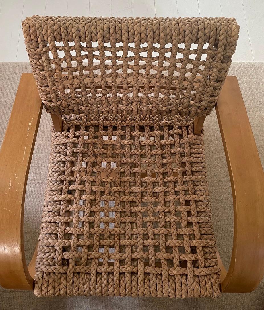 Vintage midcentury rope chair in the style of Adrien Audox and Frida Minet for Vibo. Beautifully curved bentwood and woven rope back and seat made from hand braided abaca. Striking cantilever frame, sculptural maple bentwood and textural woven rope