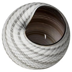 Woven Mandala (Med II), a grey, cream & bronze glass sculpture by Layne Rowe