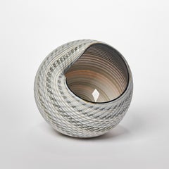 Woven Mandala No 3, a grey & bronze shell-like glass sculpture by Layne Rowe