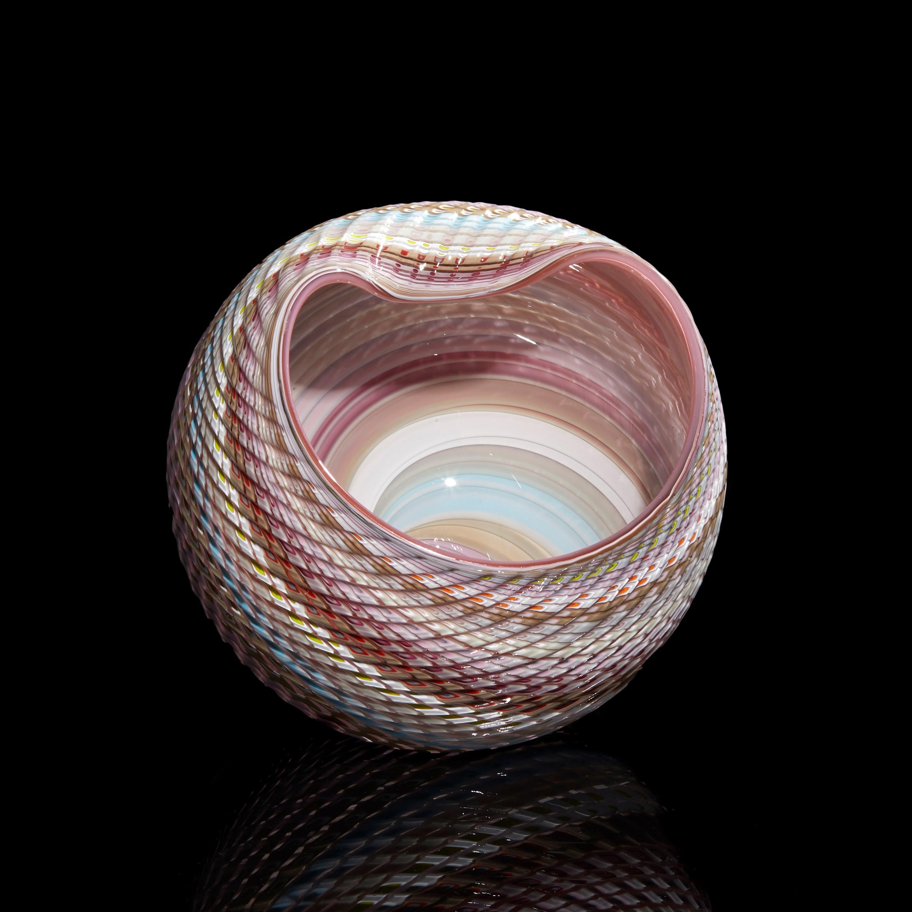 
'Woven Pastel Mandala No 6 (shiny)' is a unique handblown, sculpted and cut glass sculpture by the British artist, Layne Rowe.

Rowe’s inspiration is drawn from the dramatic Devon coastline which informs his love for detail, a constant theme for
