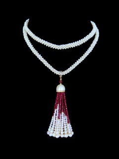 Marina J. Sautoir tissé avec rubis, diamants et pompon en or jaune 14 carats massif