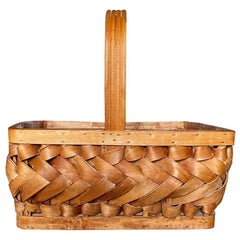 Cesta decorativa tejida de madera de puercoespín