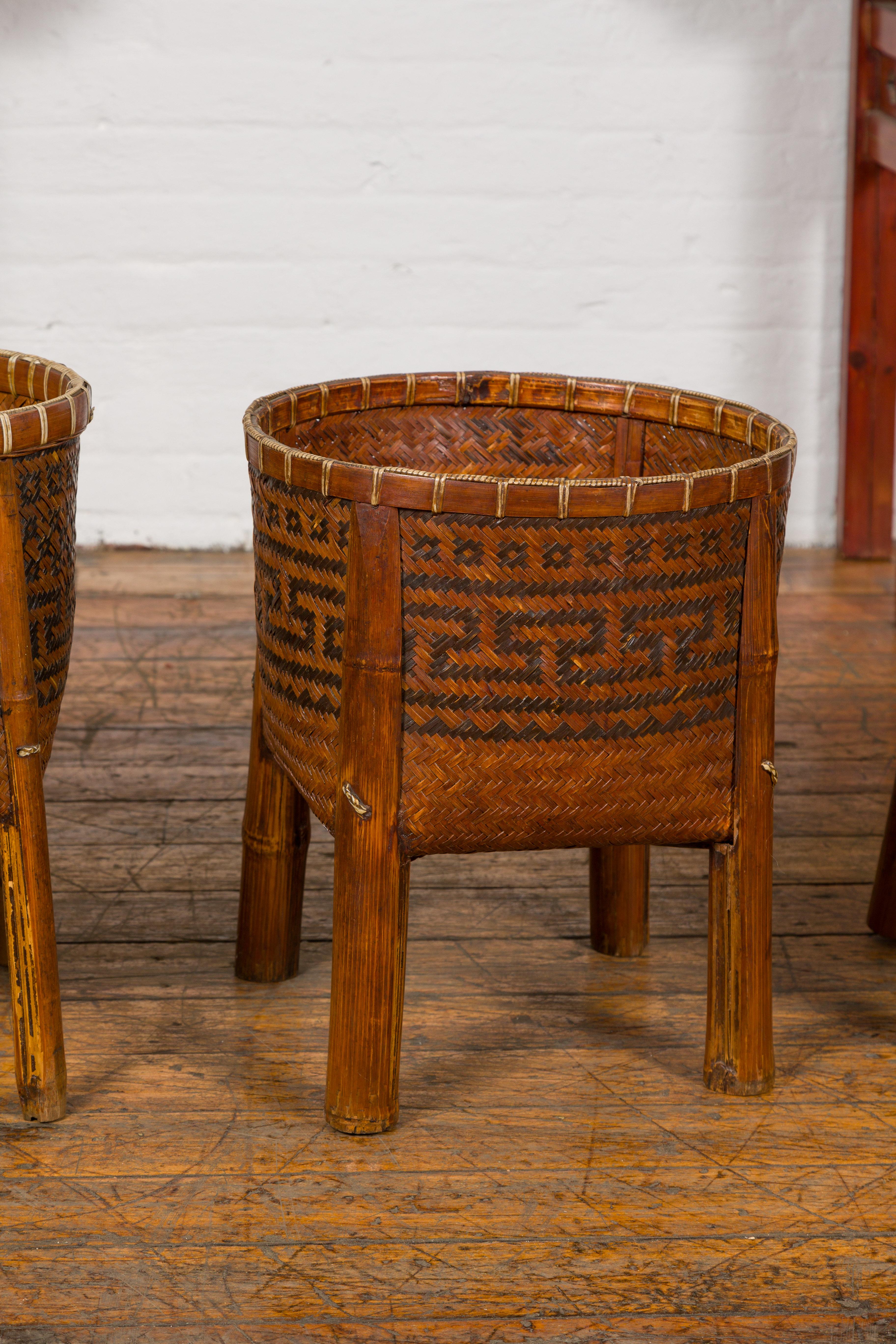 Chinese Woven Rattan Baskets on Legs with Greek Key Motifs, Four Pieces Sold Each For Sale
