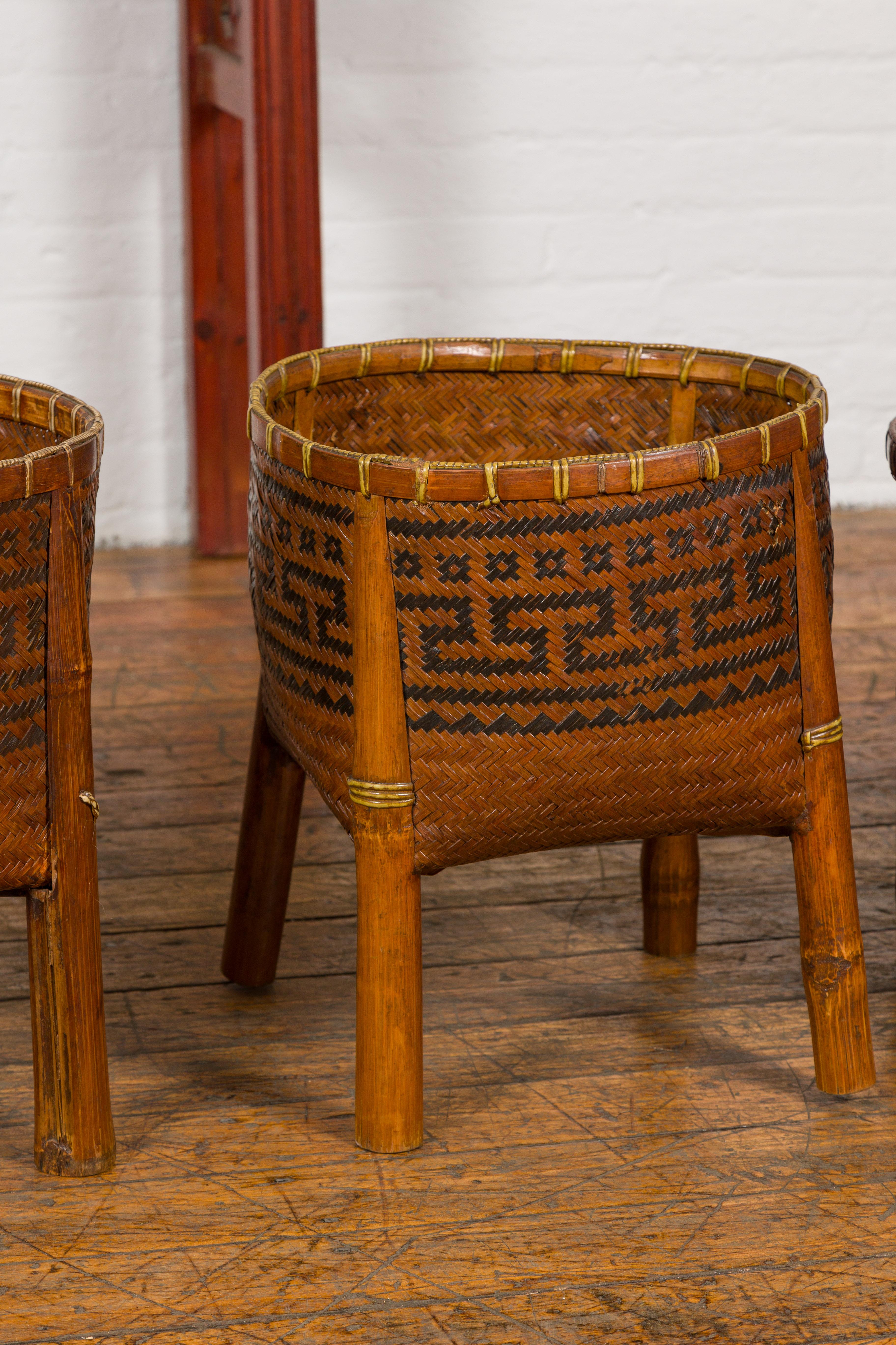 Woven Rattan Baskets on Legs with Greek Key Motifs, Four Pieces Sold Each In Good Condition For Sale In Yonkers, NY