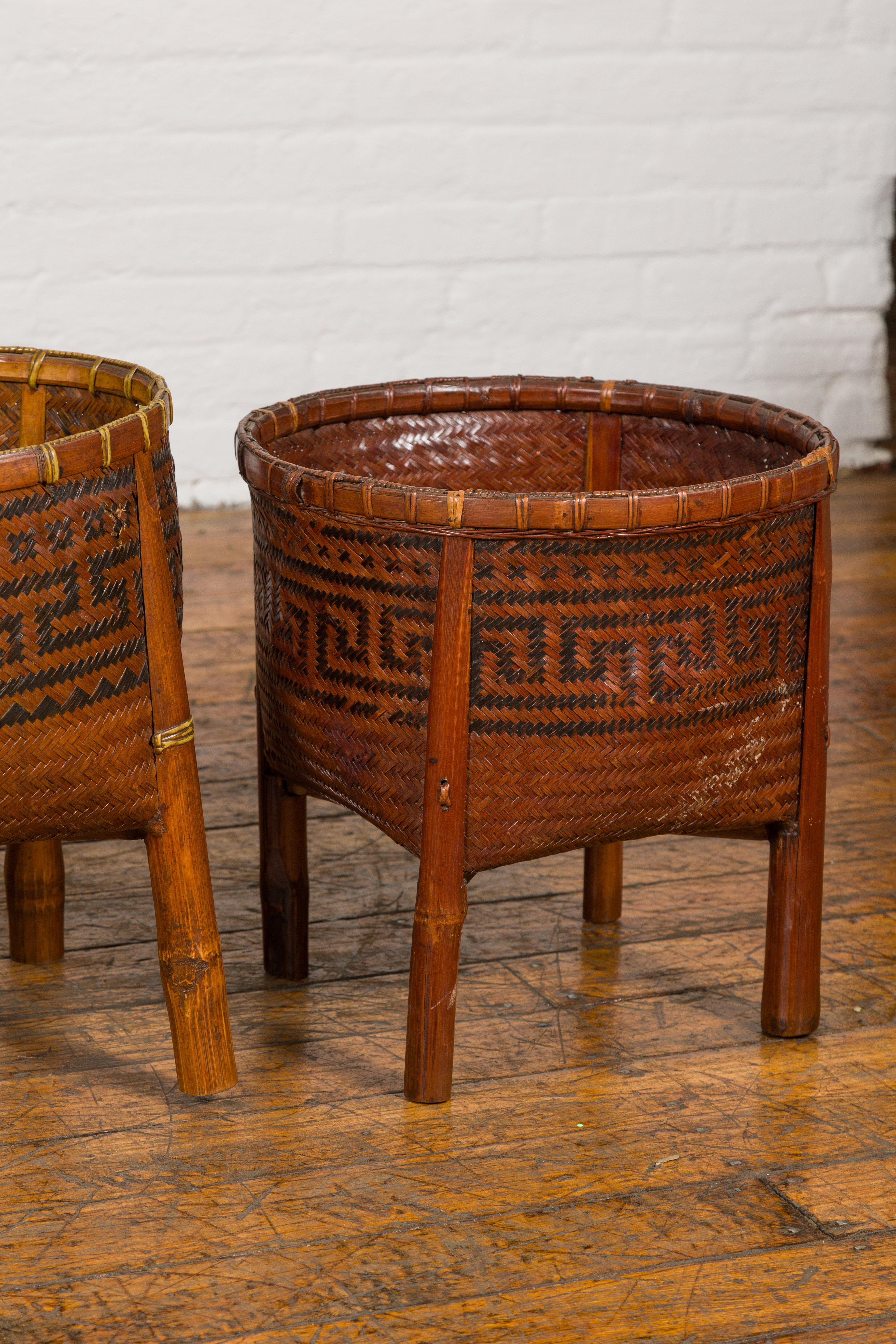 20th Century Woven Rattan Baskets on Legs with Greek Key Motifs, Four Pieces Sold Each For Sale