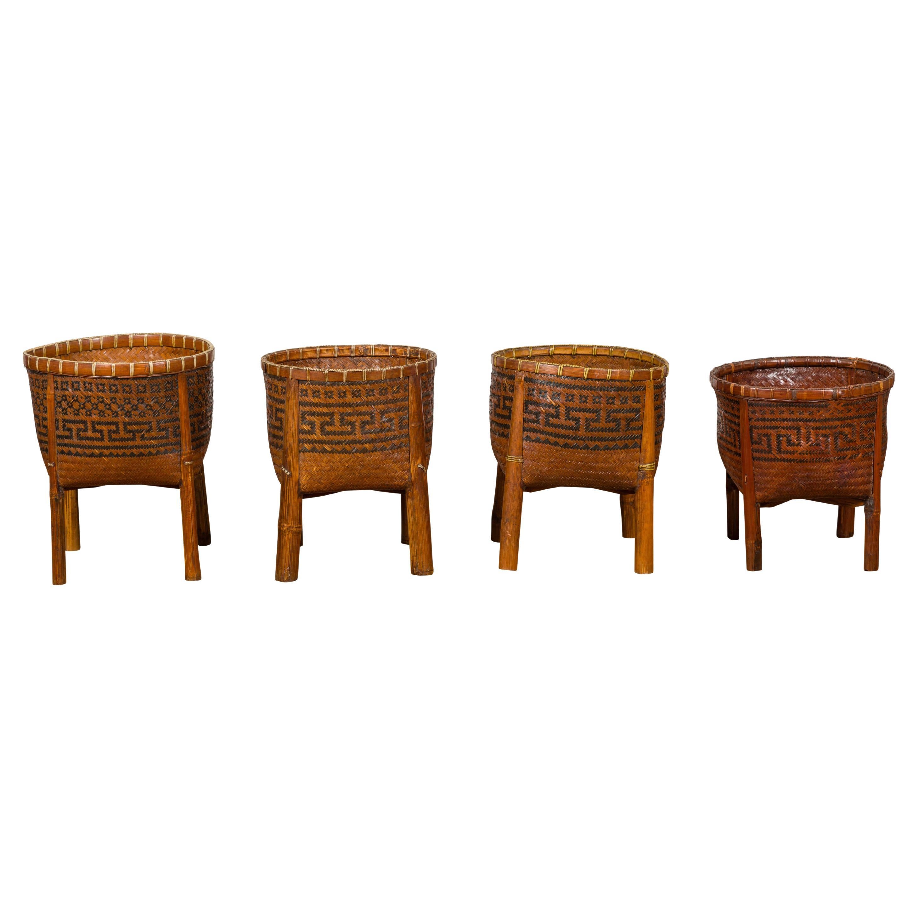 Woven Rattan Baskets on Legs with Greek Key Motifs, Four Pieces Sold Each