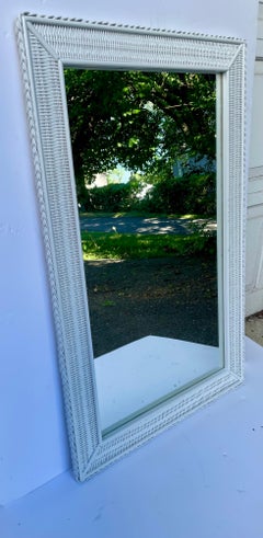 Espejo de ratán tejido