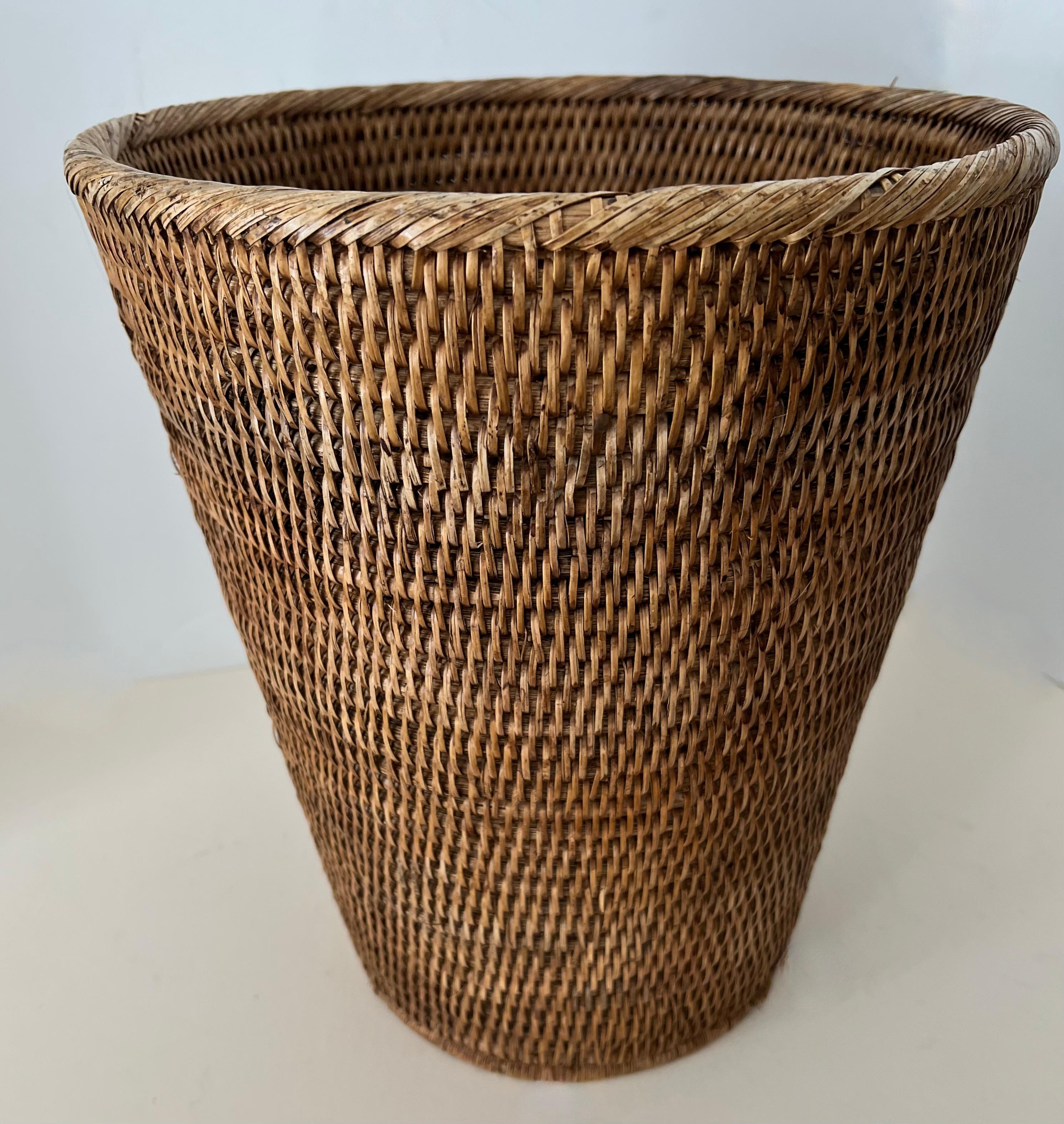 Patinated Woven Rattan Waste Basket For Sale