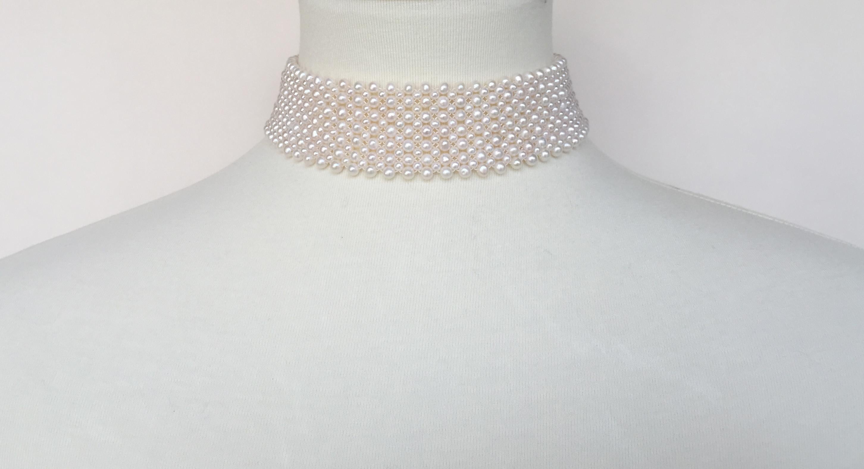 This woven round white pearl wide choker with sterling silver sliding clasp was hand crafted by Marina J.. Each glowing pearl was chosen specifically for its size and shape, creating an intricate design of small and slightly larger pearls. The
