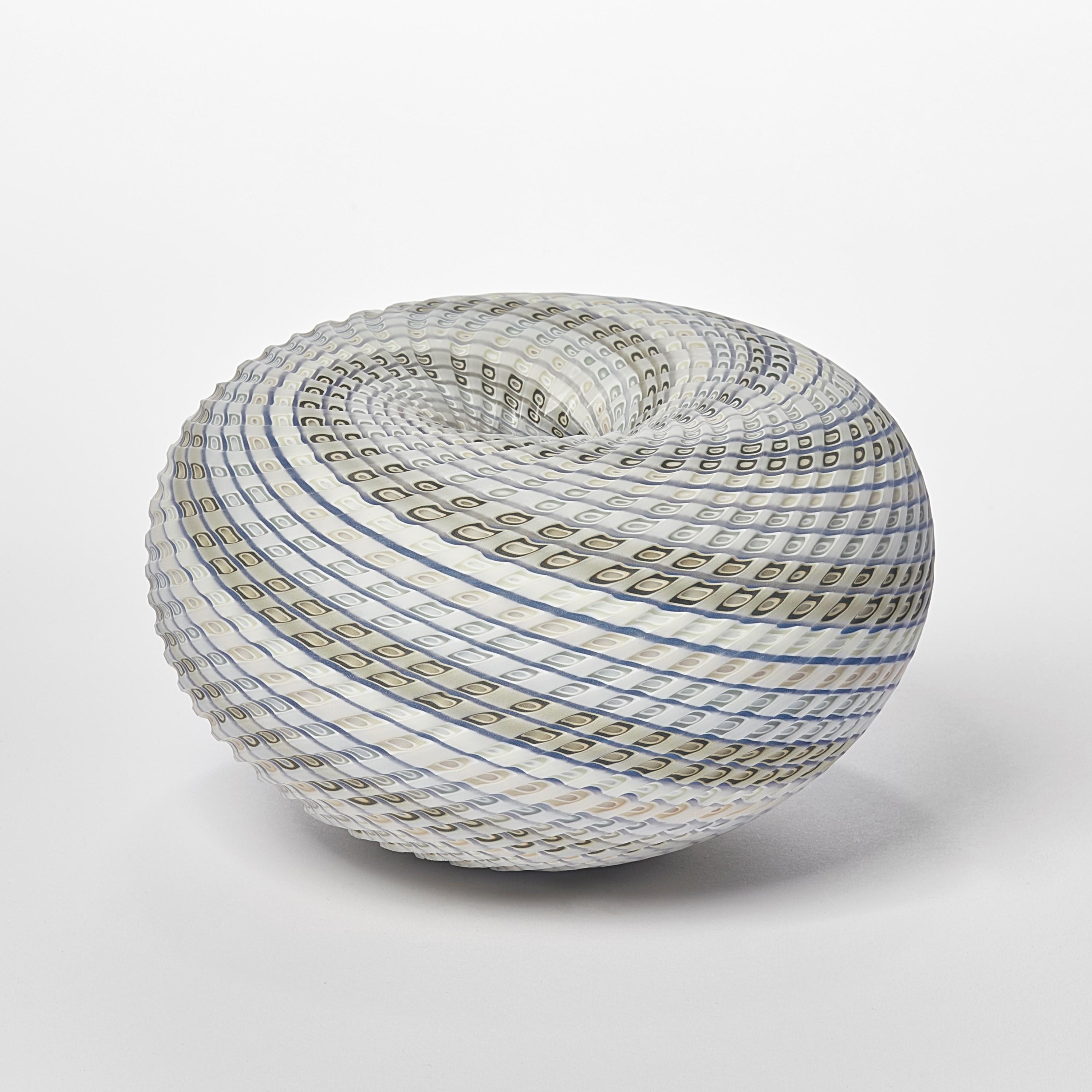 'Woven Three Tone Blue Basket' is a unique handblown, sculpted and cut glass sculpture by the British artist, Layne Rowe.

Rowe’s inspiration is drawn from the dramatic Devon coastline which informs his love for detail, a constant theme for his