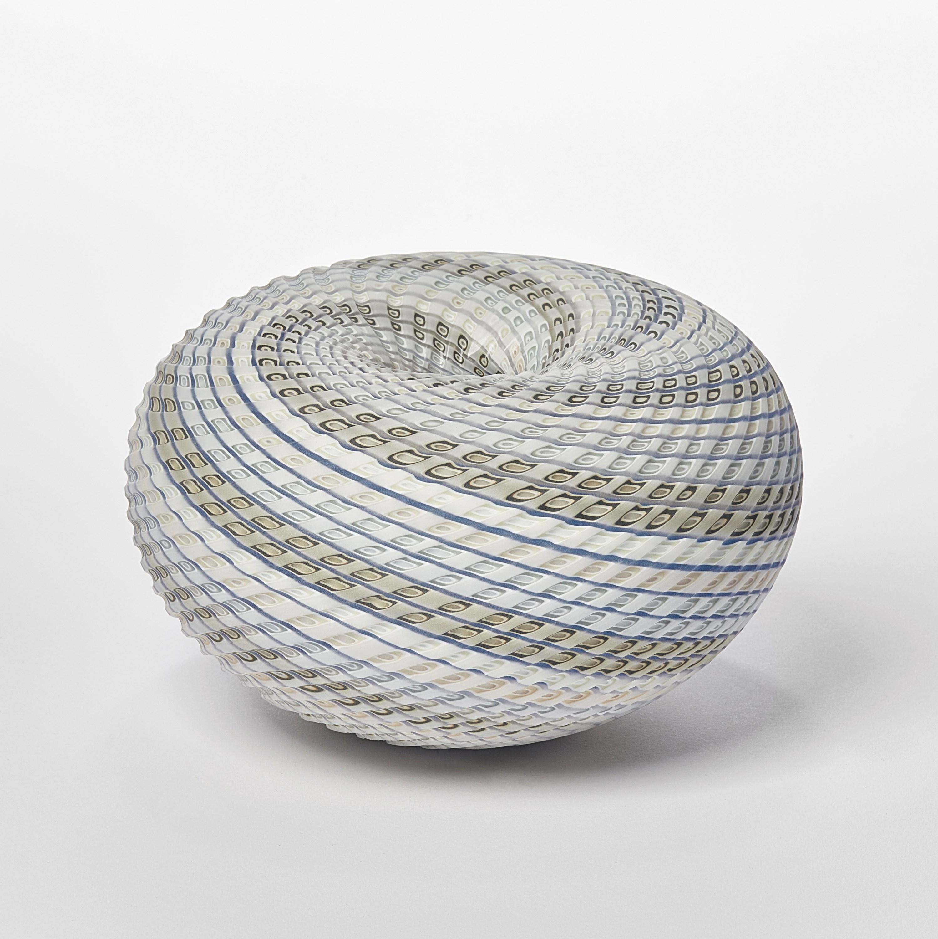 'Woven Three Tone Blue Basket' is a unique handblown, sculpted and cut glass sculpture by the British artist, Layne Rowe.

Rowe’s inspiration is drawn from the dramatic Devon coastline which informs his love for detail, a constant theme for his