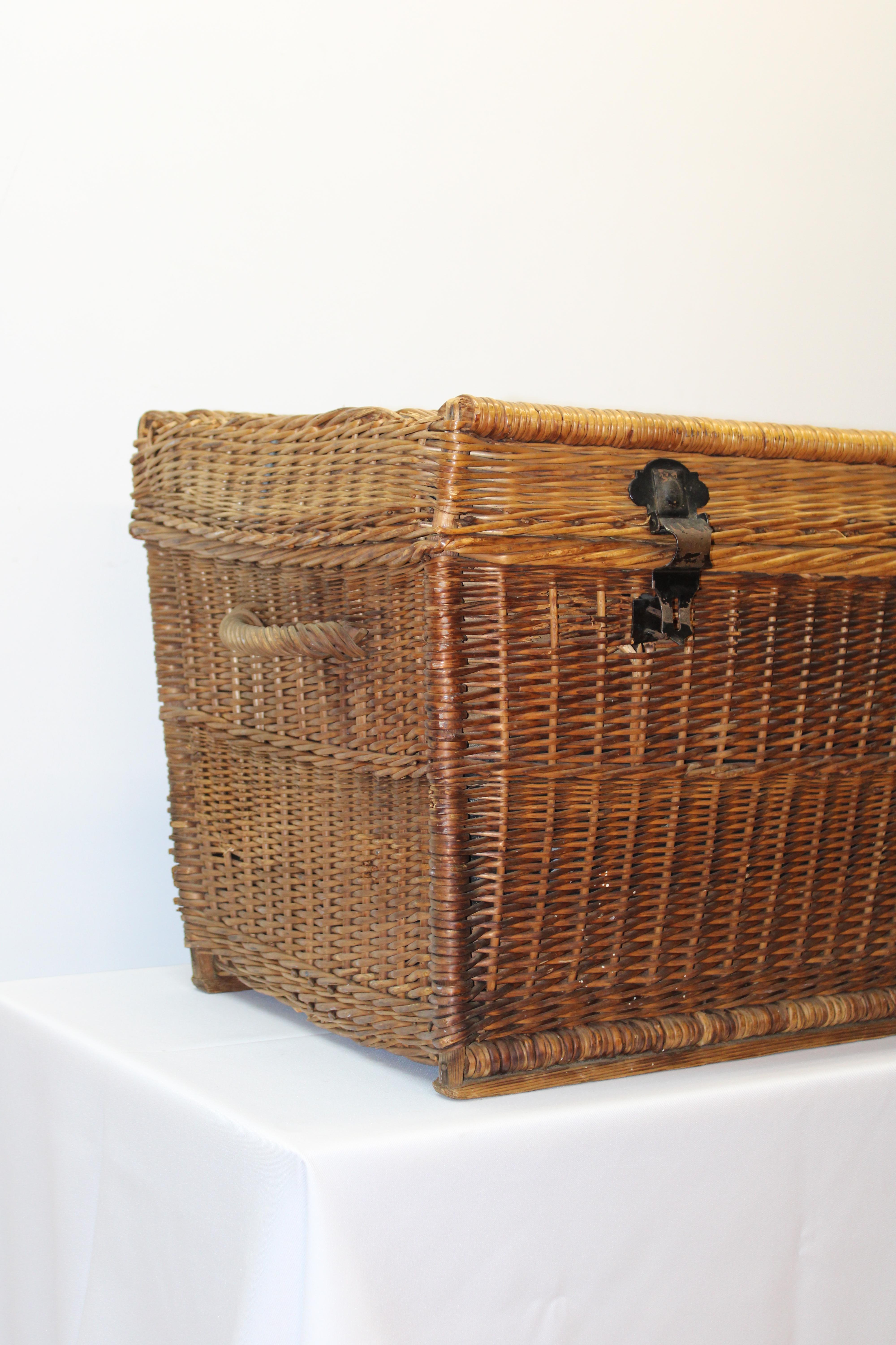 C. Late 19th century / early 20th century

Woven traveling fabric lined case / basket / picnic basket.