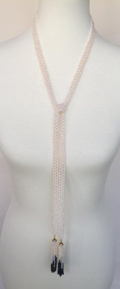 Woven White Pearl Sautoir with 14 Karat Gold, Pearl, and Black Spinel Tassels