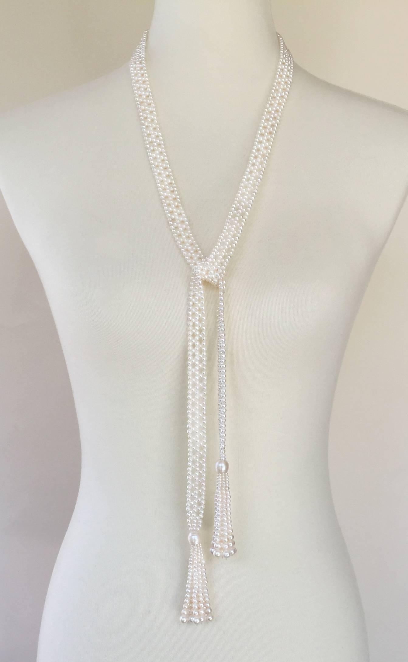 The weave of this elegant Sautoir is created with beautiful 2.5- 3 mm pearls. The lace-like design is delicate and graceful. The tassels start with a shimmering brilliant half white pearl. Each strand of the 3.2-inch tassel is composed graduated 1