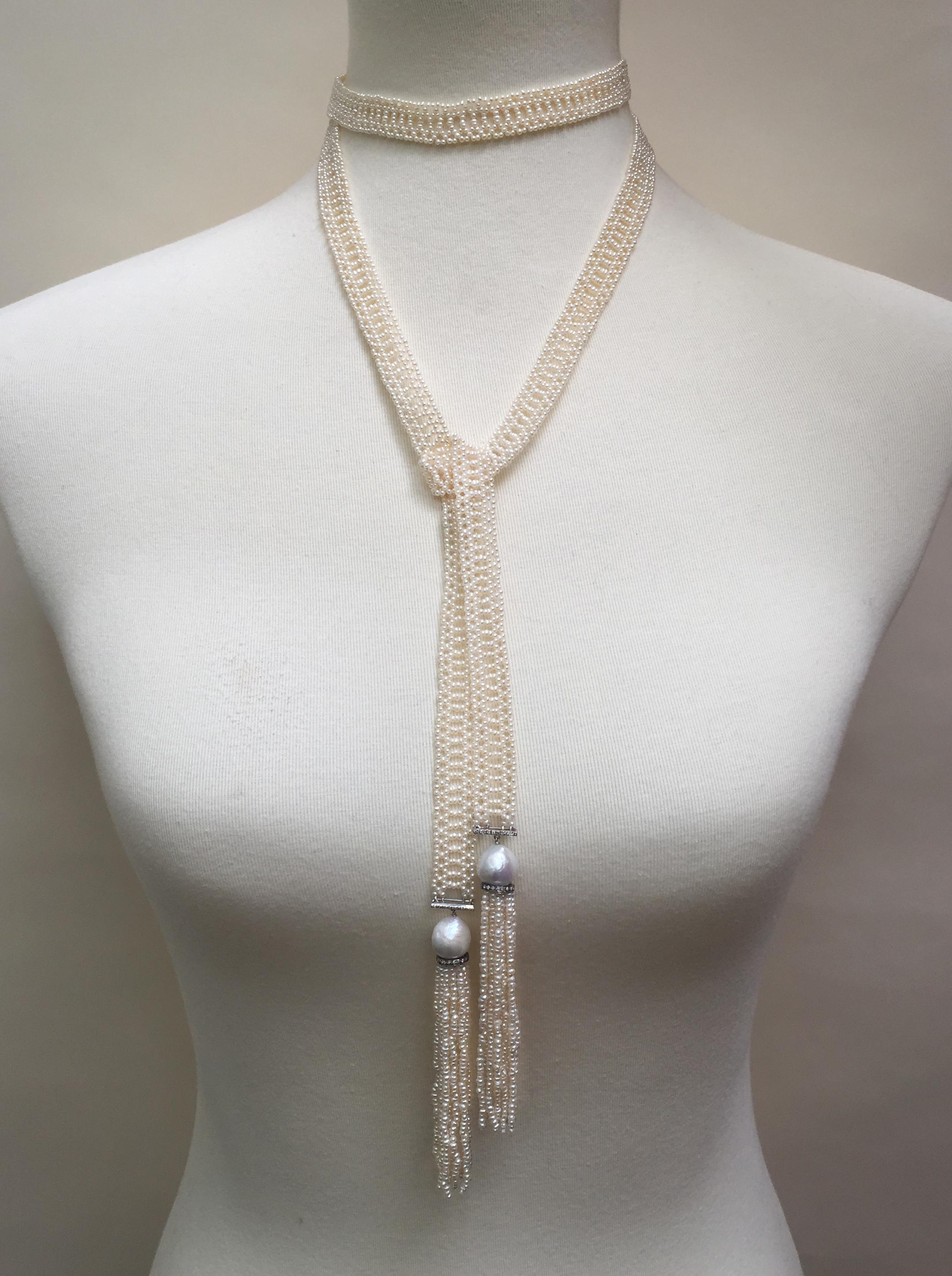 This woven white seed pearl sautoir has elegant pearl tassels accented with diamond encrusted silver roundels and 14k white gold bars with diamonds. The delicate intricately woven lace like design of the sautoir has a grace and luxury to it. At 51